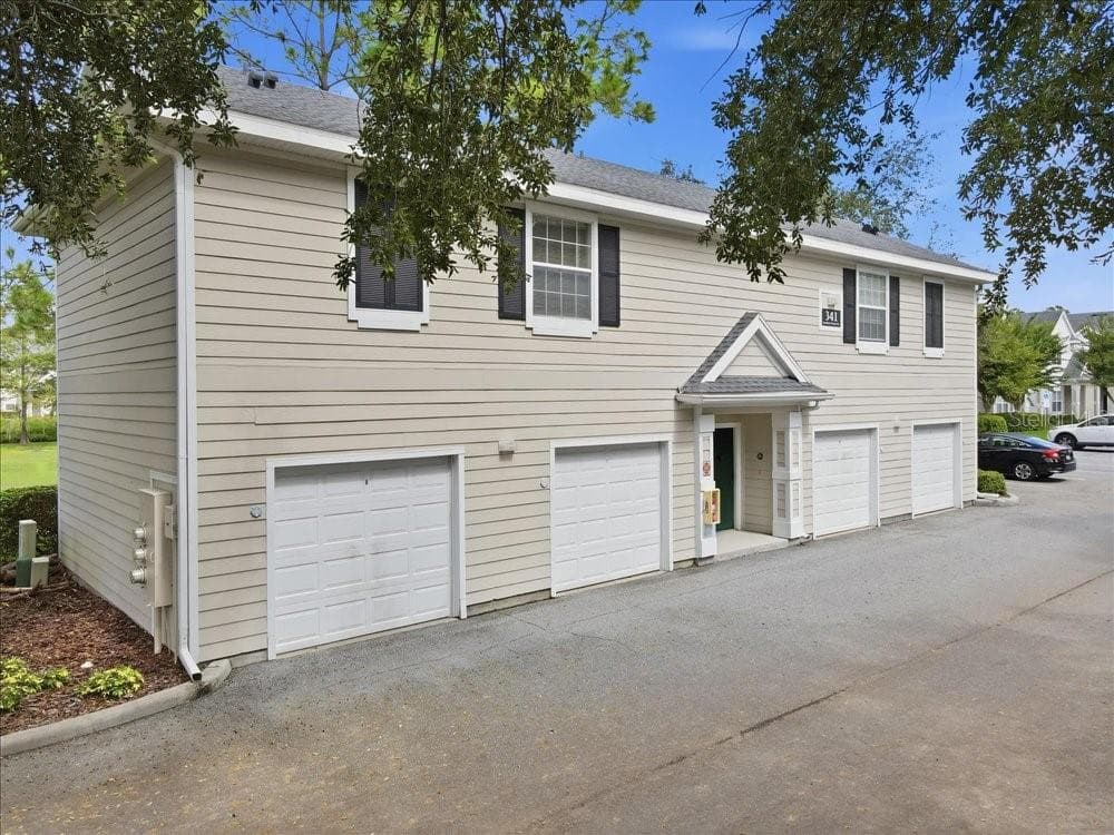 Aerial Front Exterior - 341 SOUTHERN PECAN CIR #202, WINTER GARDEN