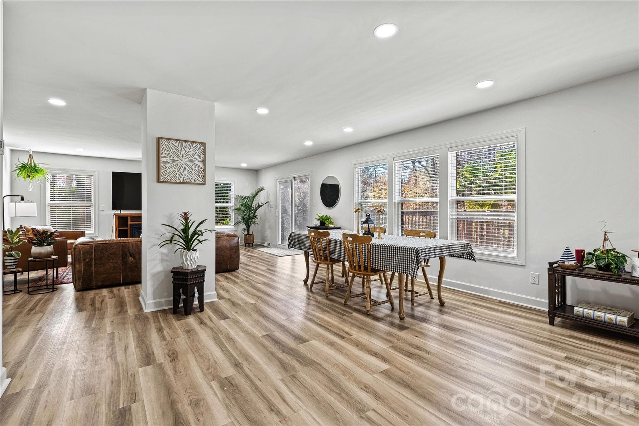 Kitchen, dining area and great room, open concept perfect for friends and family to gather - 3995 Burton Lane, Denver