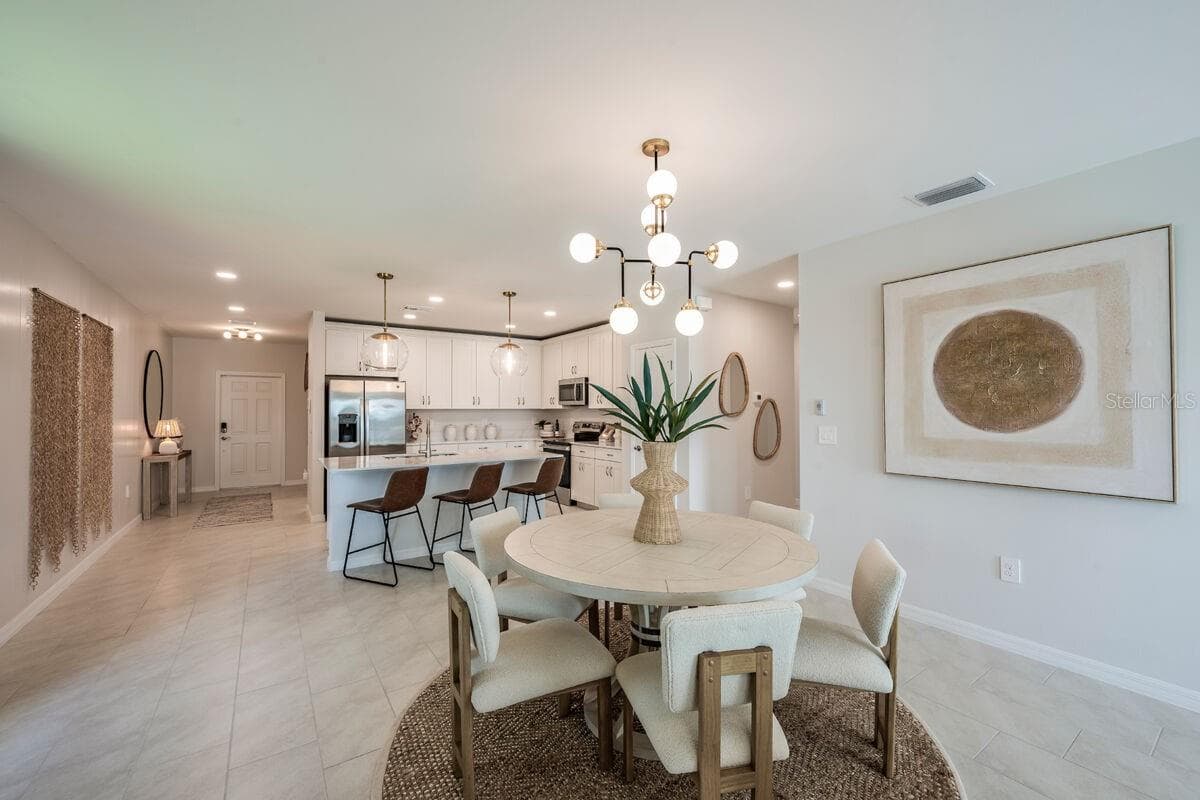 Dining-Photo description represents the model home of same floor plan. - 24500 SW KINGSWAY CIR, LAKE SUZY