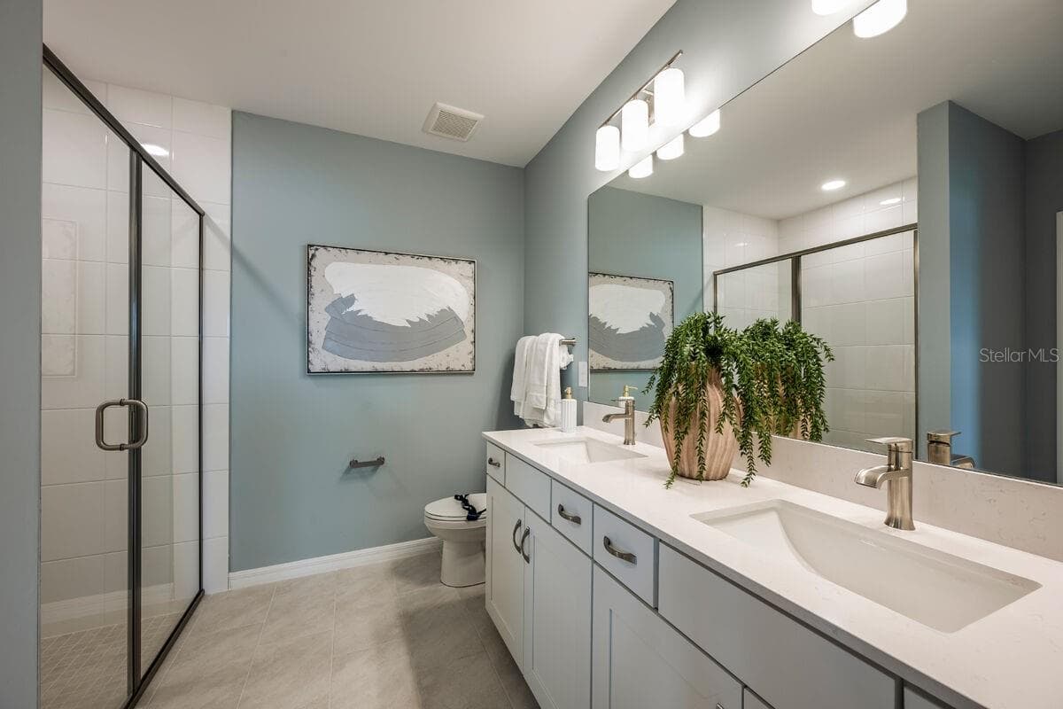 Owners Bath-Photo description represents the model home of same floor plan. - 24500 SW KINGSWAY CIR, LAKE SUZY