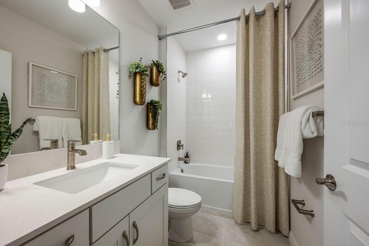 Bath-Photo description represents the model home of same floor plan. - 24500 SW KINGSWAY CIR, LAKE SUZY
