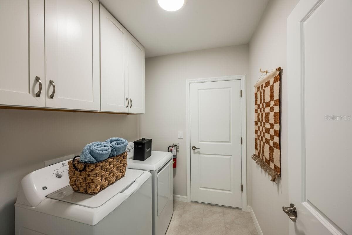 Laundry-Photo description represents the model home of same floor plan. - 24500 SW KINGSWAY CIR, LAKE SUZY