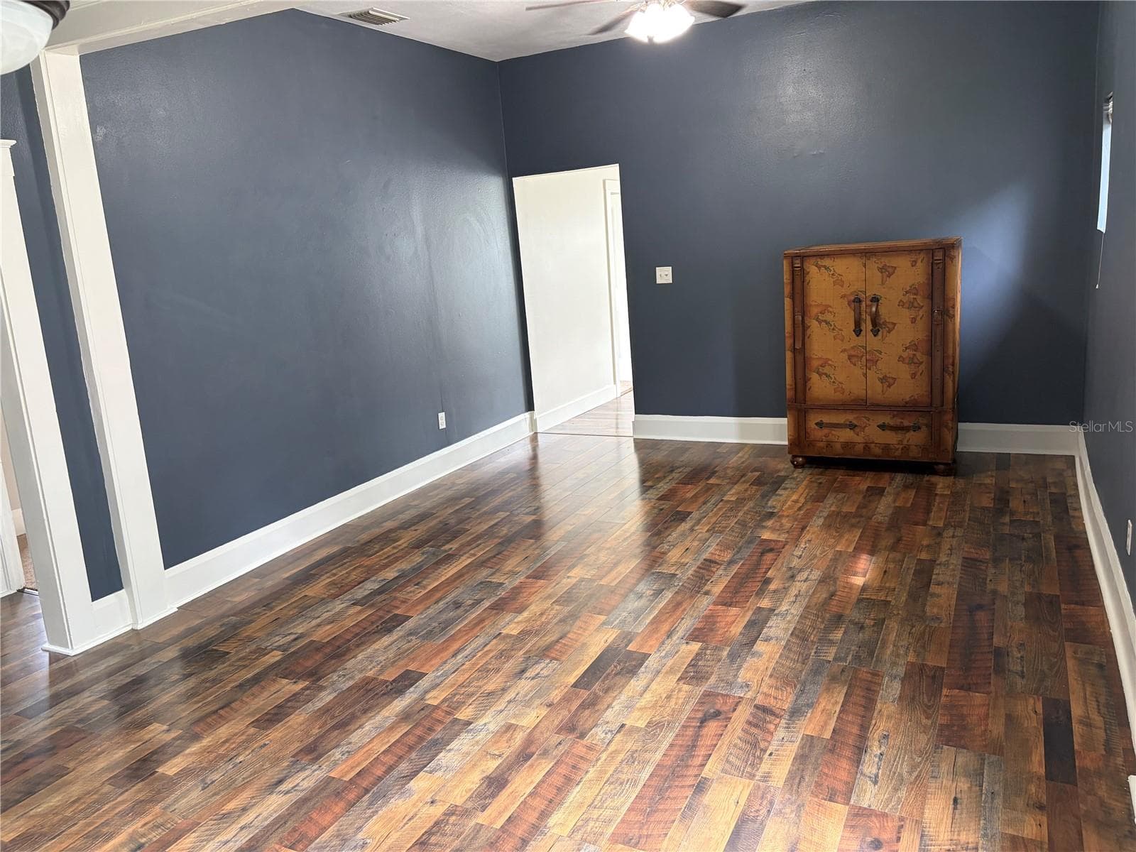 Living room/dining room looking towards front - 1199 KING AVE, LAKELAND