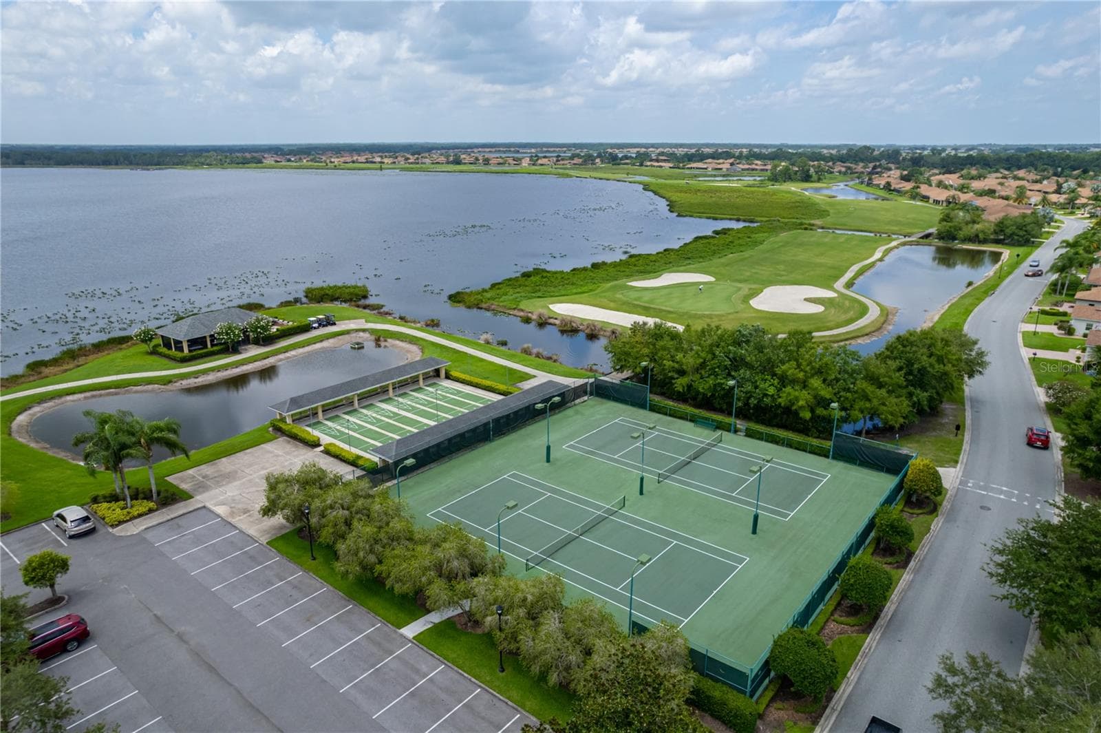 Clubhouse lighted tennis & shuffleboard courts - 3834 LITCHFIELD LOOP, LAKE WALES