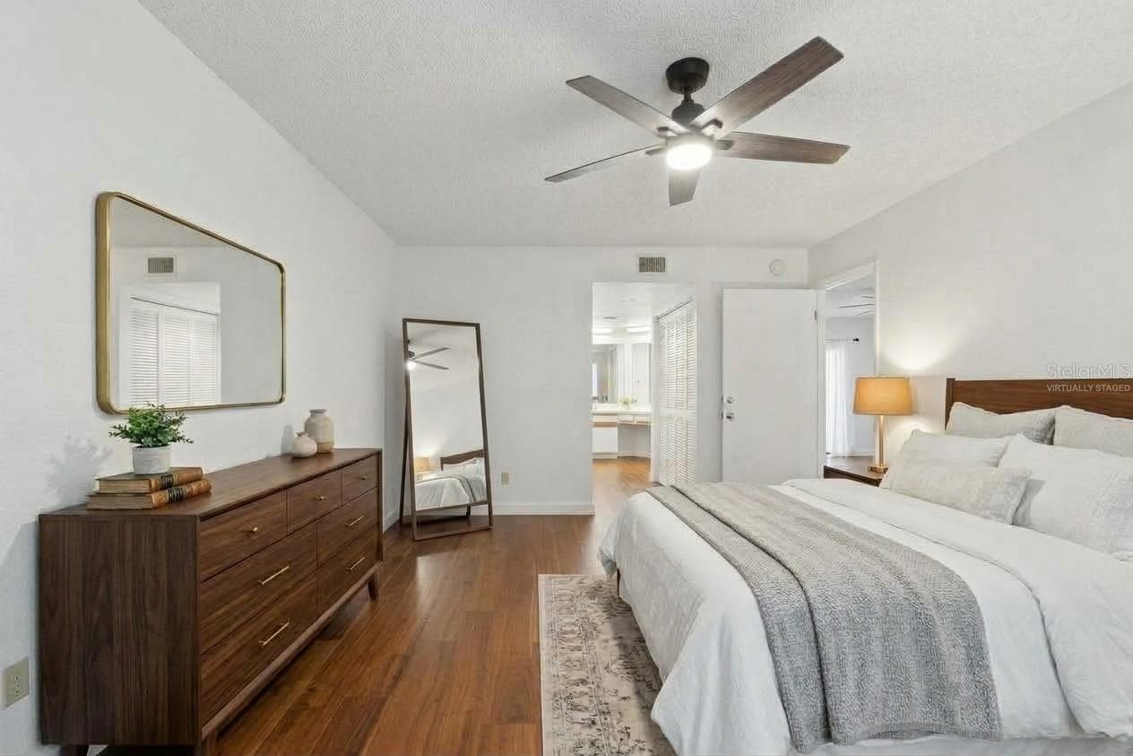 Virtually Staged Primary Bedroom - 11800 PARK BLVD #401, SEMINOLE
