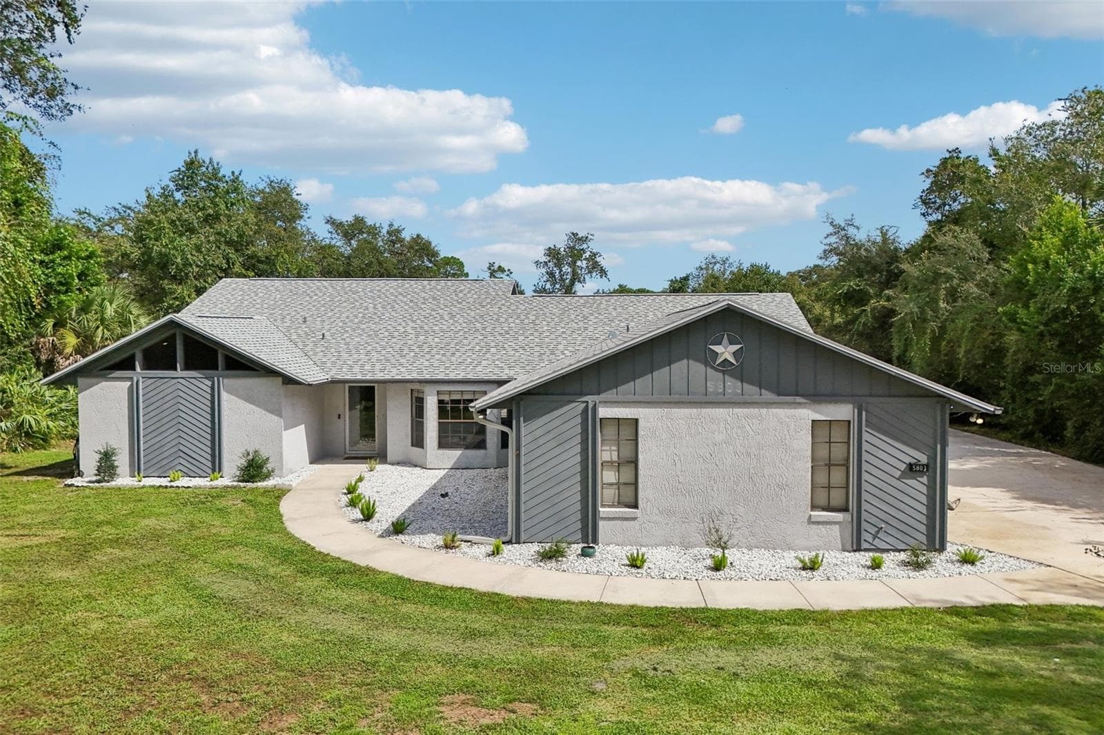 5803 SPRUCE CREEK WOODS DR