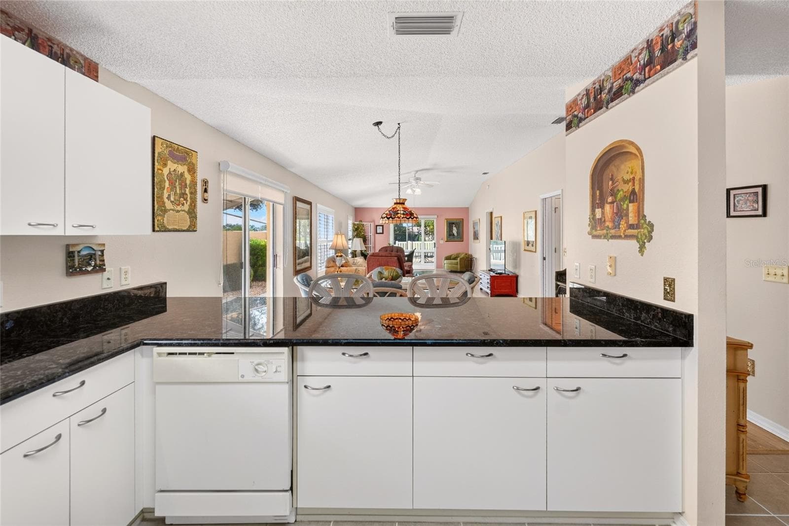 View into villa from kitchen - 3257 ARCHER AVE, THE VILLAGES