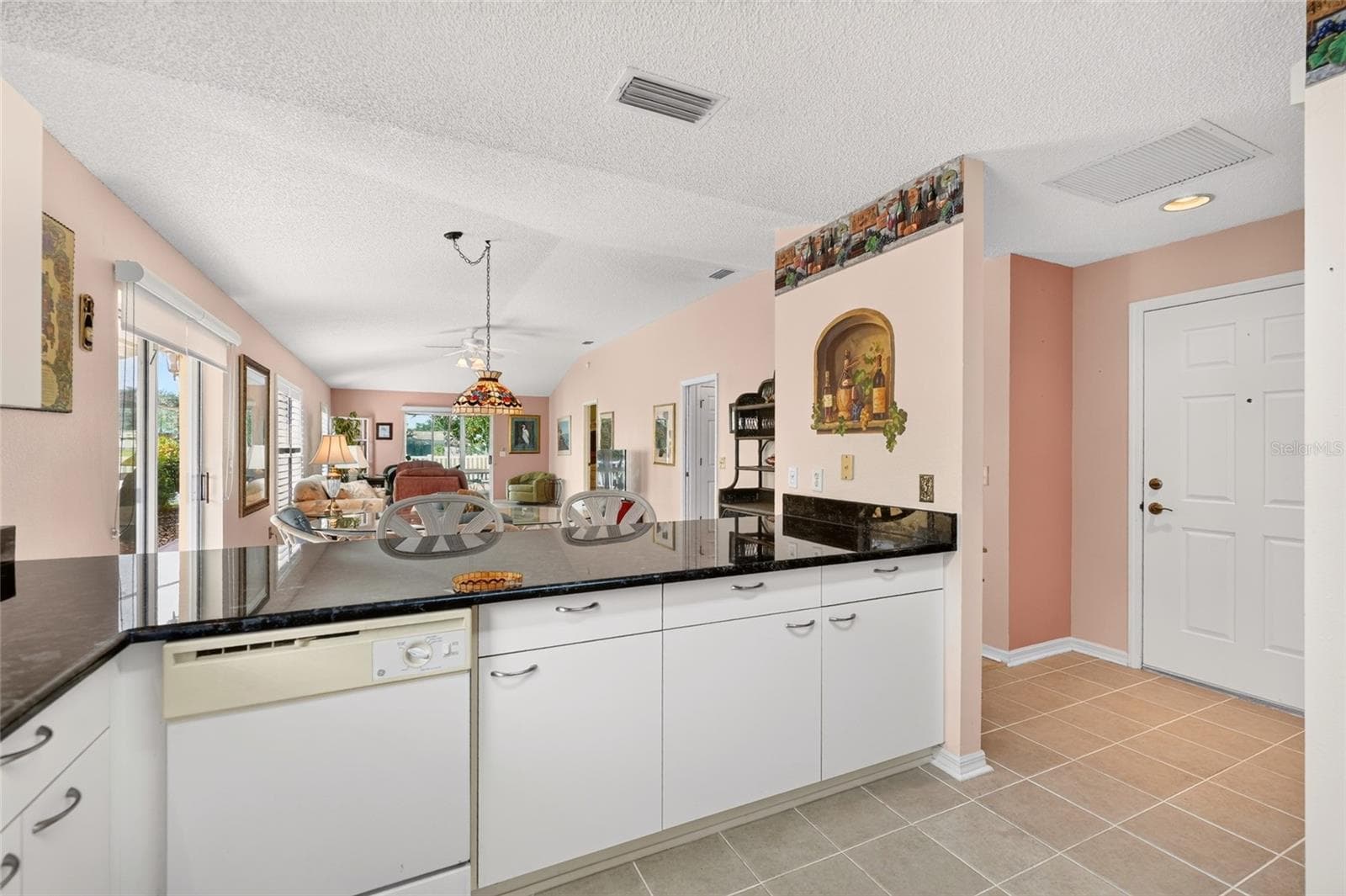 View into villa from kitchen - 3257 ARCHER AVE, THE VILLAGES