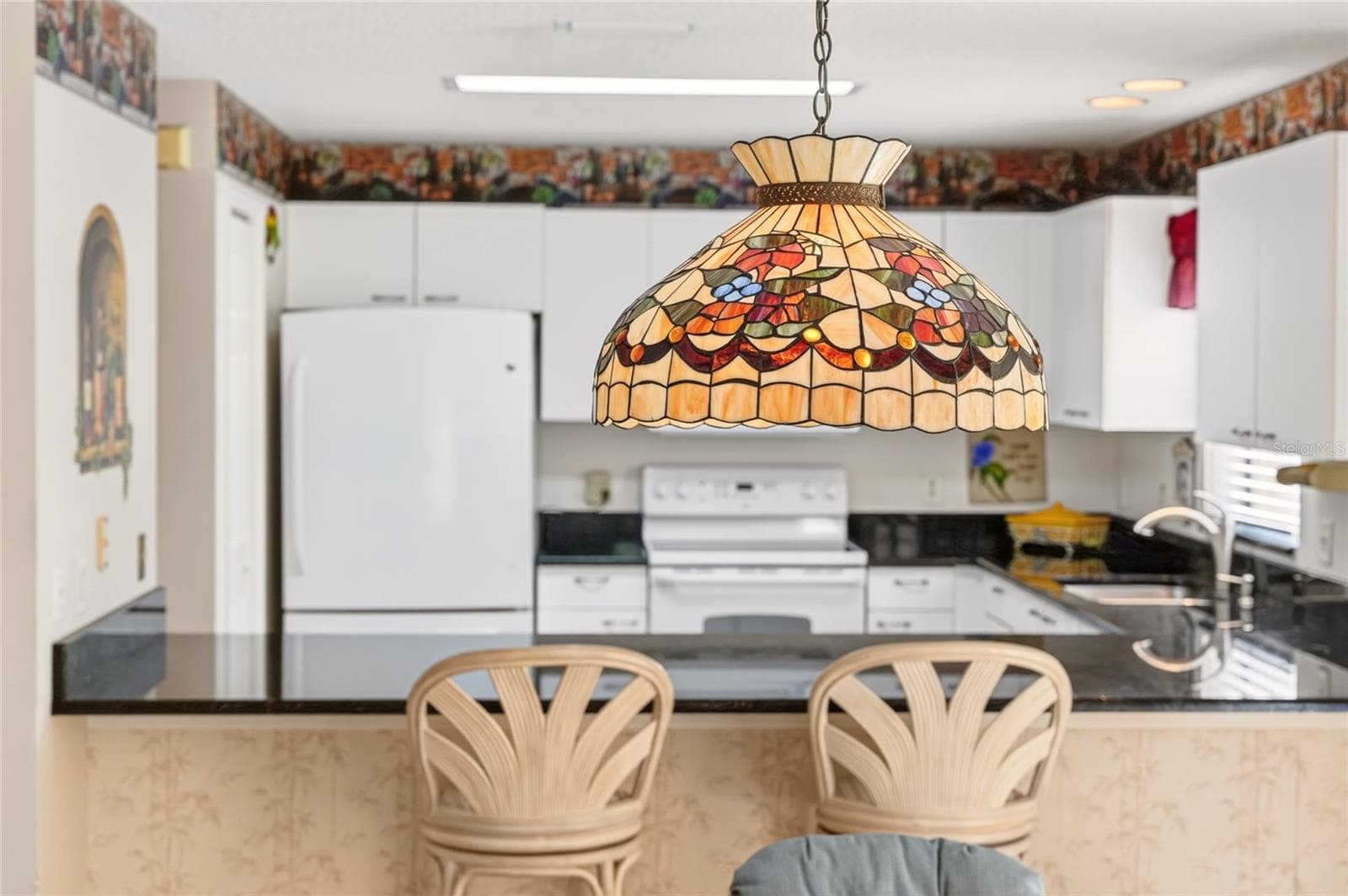 View into the kitchen - 3257 ARCHER AVE, THE VILLAGES