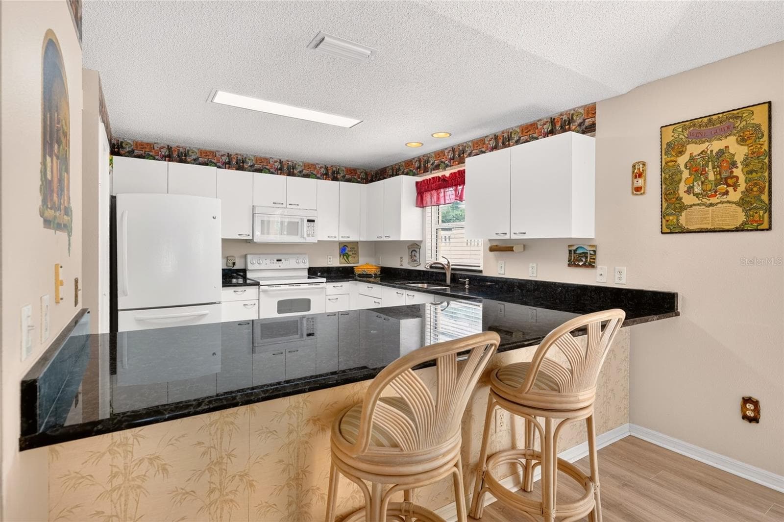 View into the kitchen - 3257 ARCHER AVE, THE VILLAGES