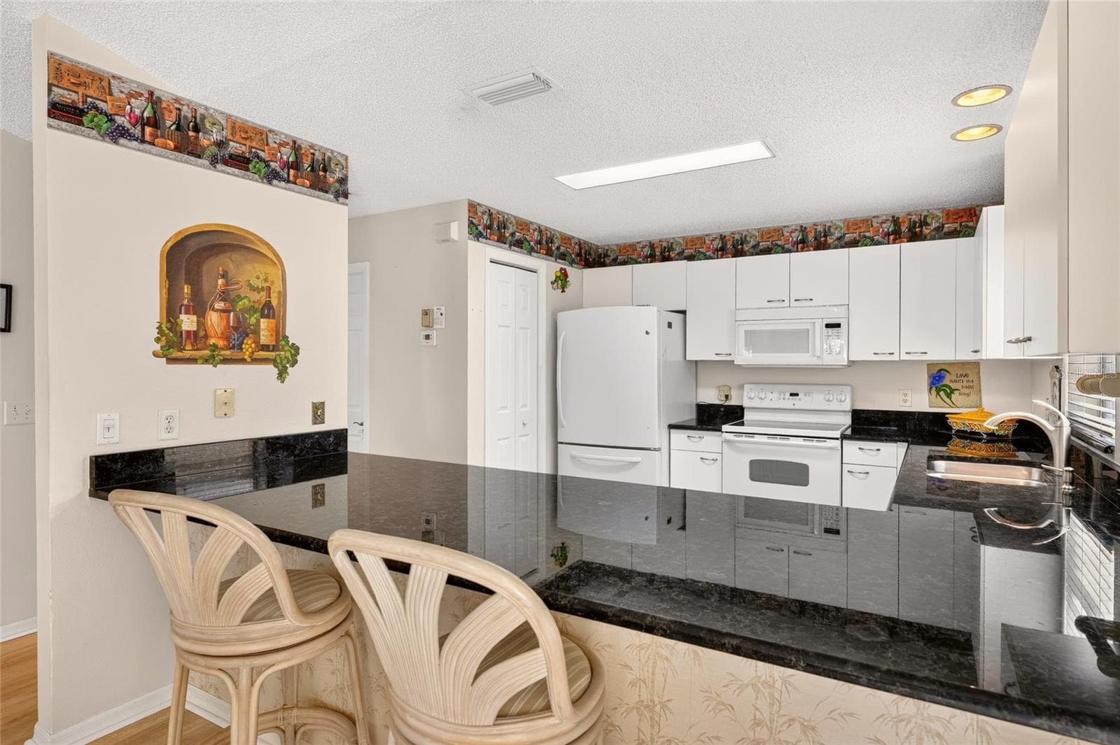 View into the kitchen - 3257 ARCHER AVE, THE VILLAGES