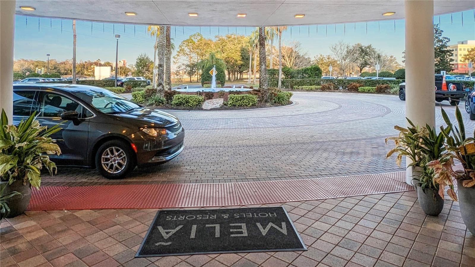 View of Entry to Resort! A Condo-Tel like this would not be Actively Managed by you as the actual Owner as a Short-Term Rental, and is NOT an Air-BnB. You own the unit, yet there is NOTHING for you Manage or Deal With…as the Condo-Tel does ALL Aspects of Marketing, Management and Property Maintenance - 225 CELEBRATION PL #212, KISSIMMEE