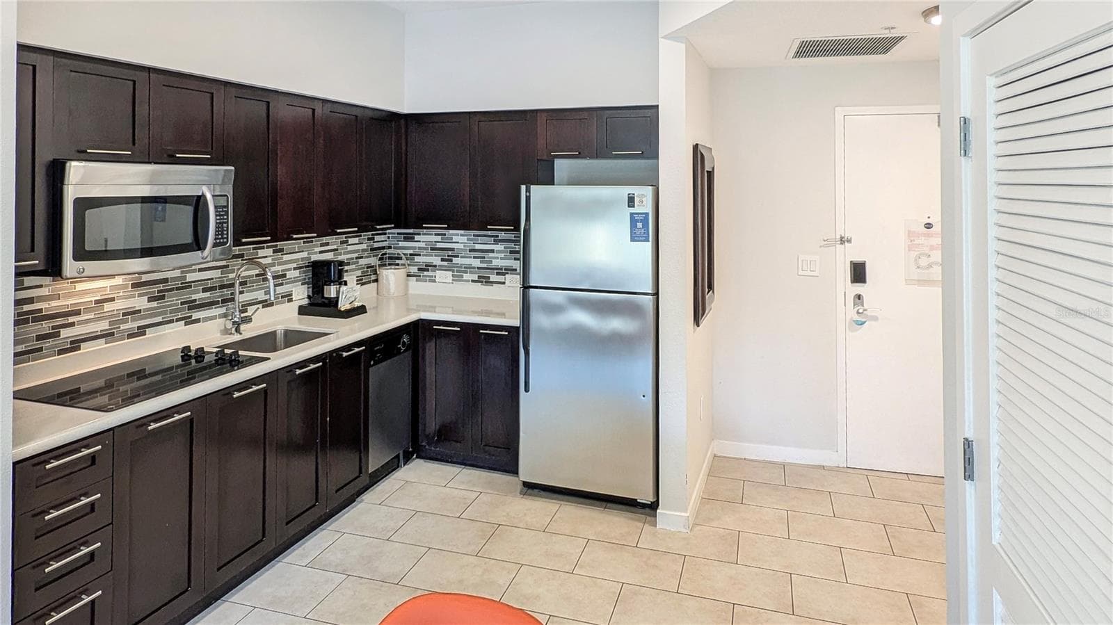 Kitchen and Front Entry! - 225 CELEBRATION PL #212, KISSIMMEE