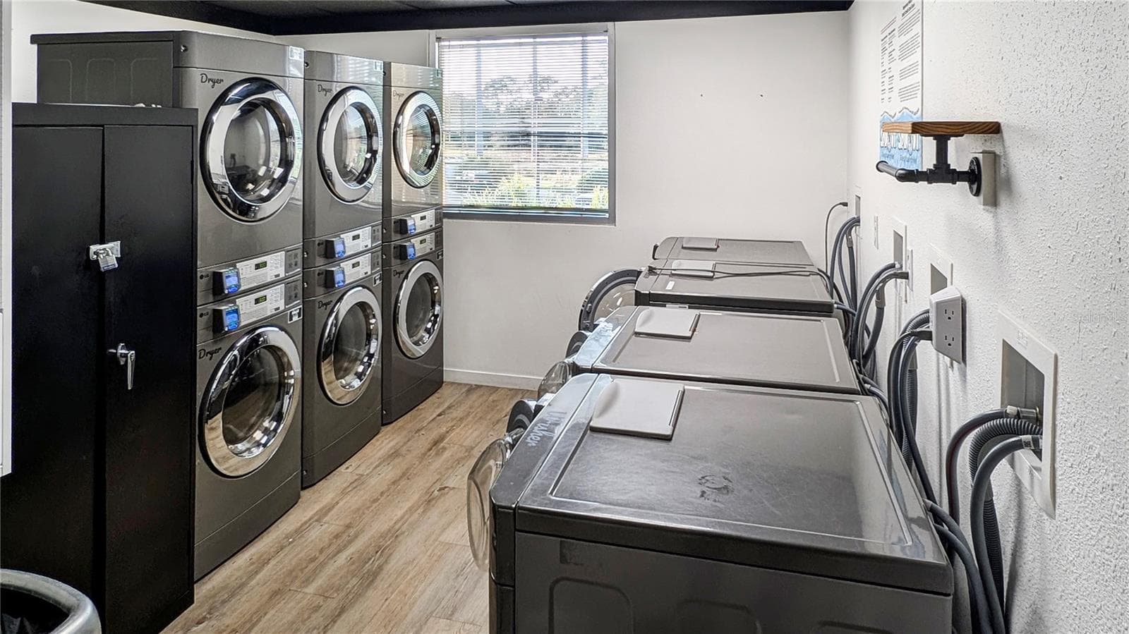 Community Laundry Room only a 10 Second Walk from Your Home's Front Door! - 225 CELEBRATION PL #212, KISSIMMEE
