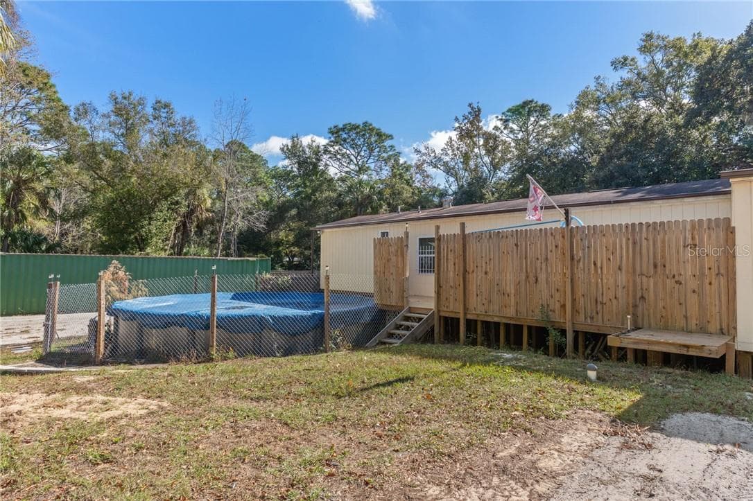 View of Pool and Back Porch - 193 Gladys AVE, INGLIS FL 34449, Inglis
