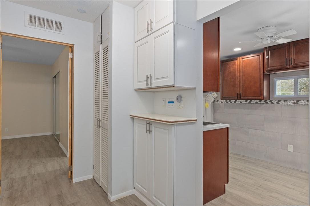 Kitchen and view of laundry room - 193 Gladys AVE, INGLIS FL 34449, Inglis