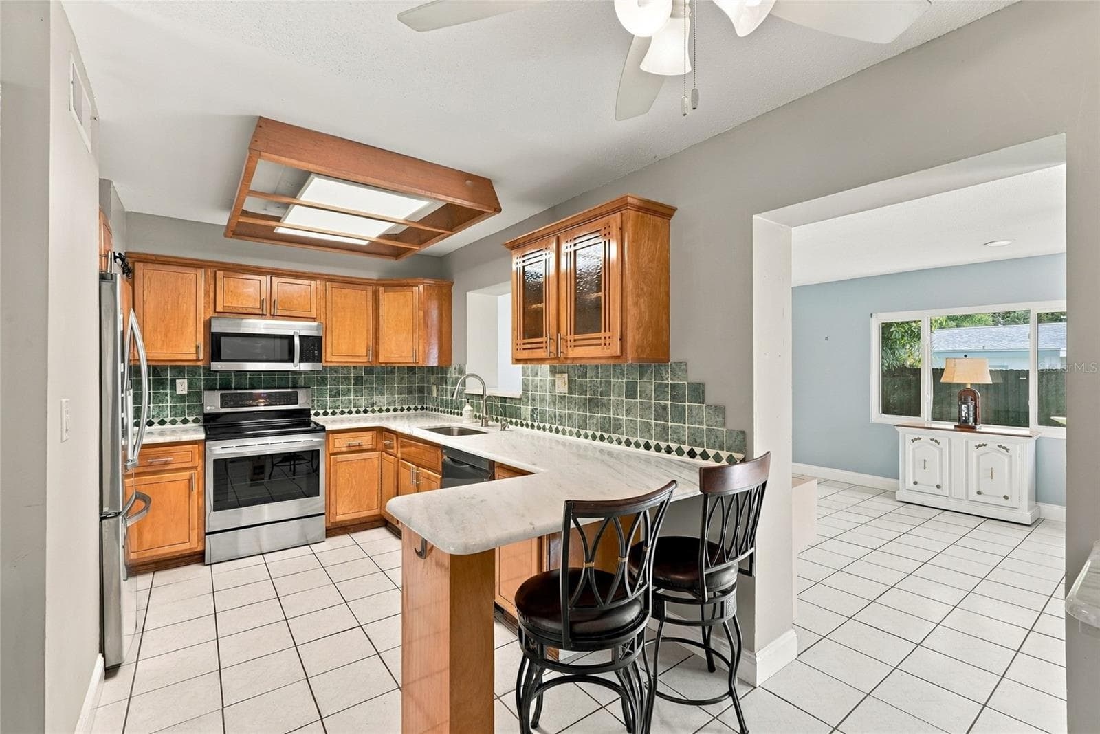 Single Family Residence at 9727 GROVELAND ST, SEMINOLE, photo 8 of 44