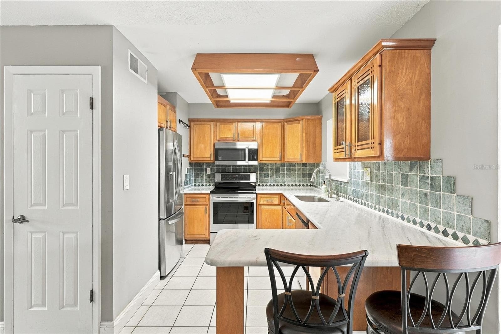 Single Family Residence at 9727 GROVELAND ST, SEMINOLE, photo 9 of 44