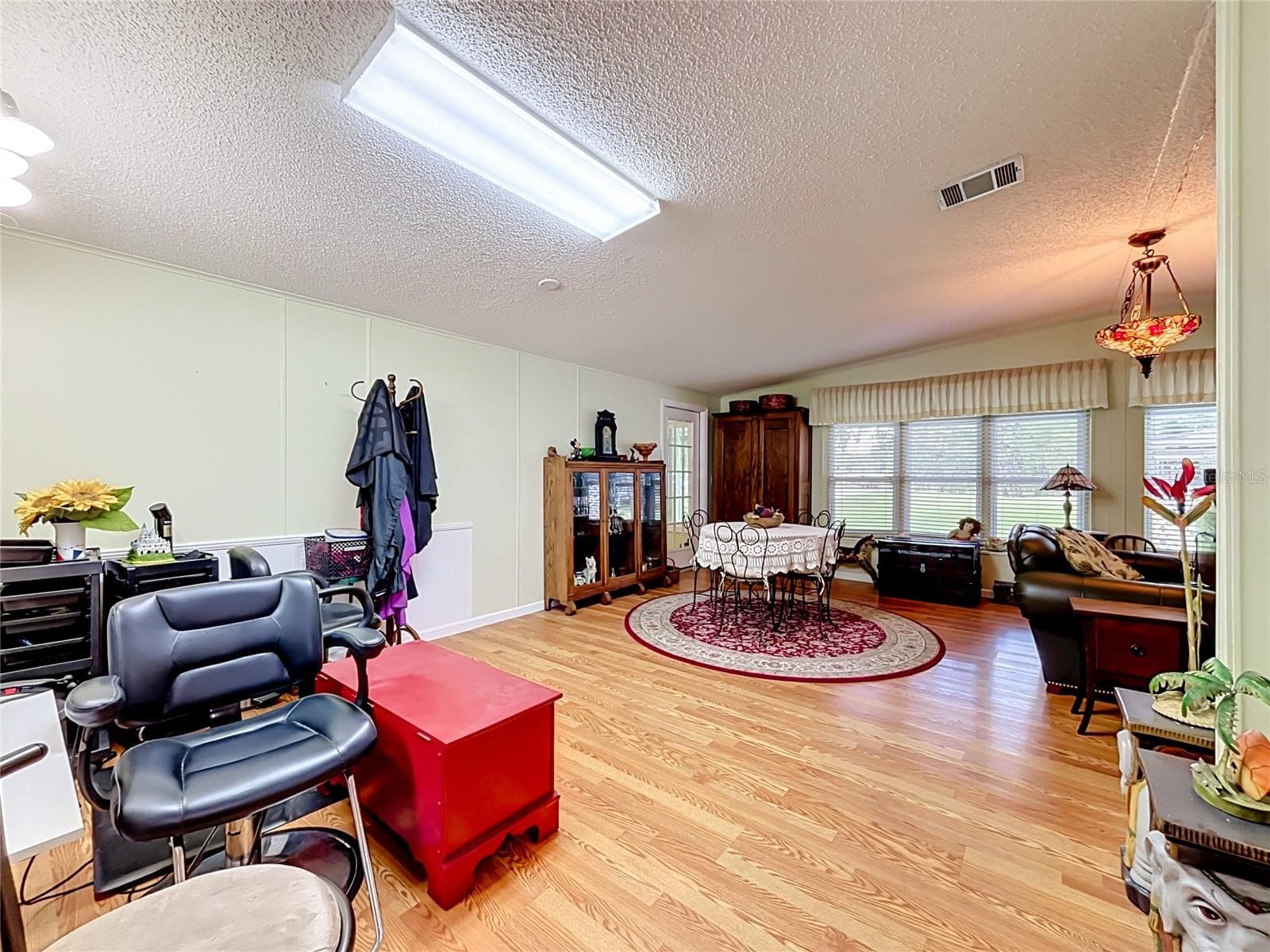 Large dining area currently doubles as a in-house work space but easily converted back to a spacious formal dining area. - 218 COVENT GARDEN AVE, DAVENPORT