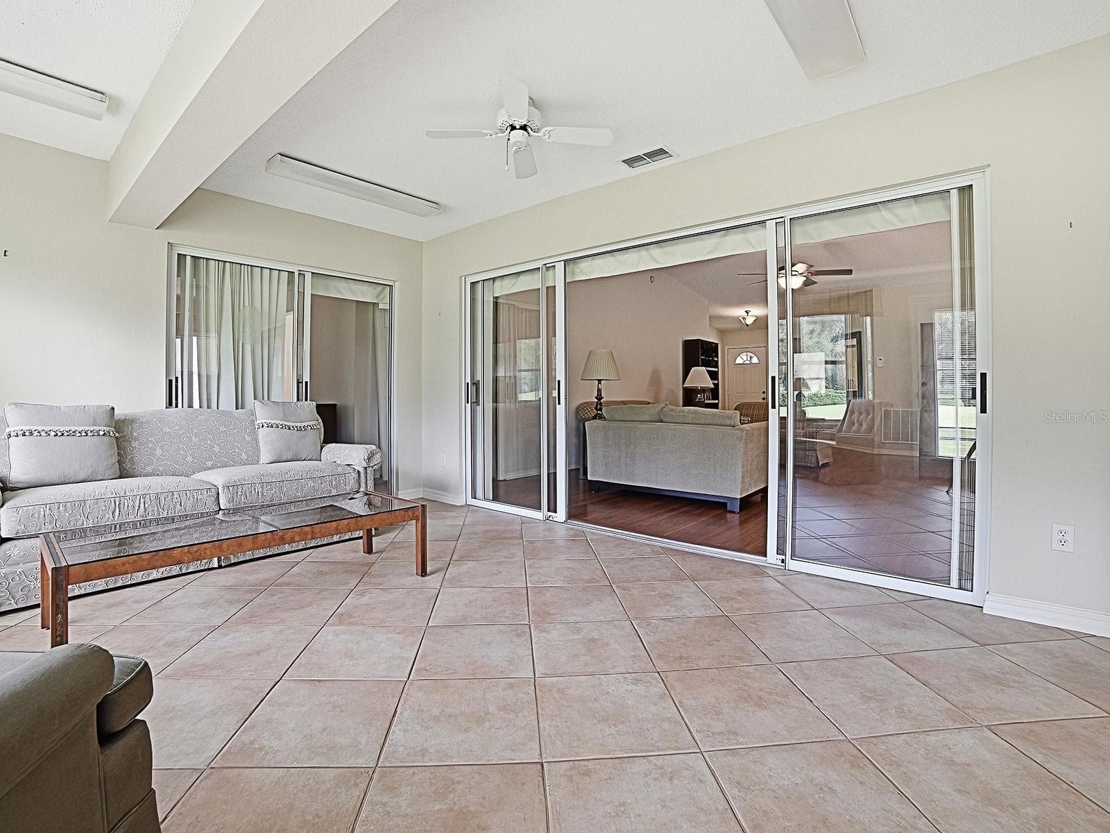 SO MUCH NATURAL LIGHT IN YOUR LANAI - 32543 OAK PARK DR, LEESBURG