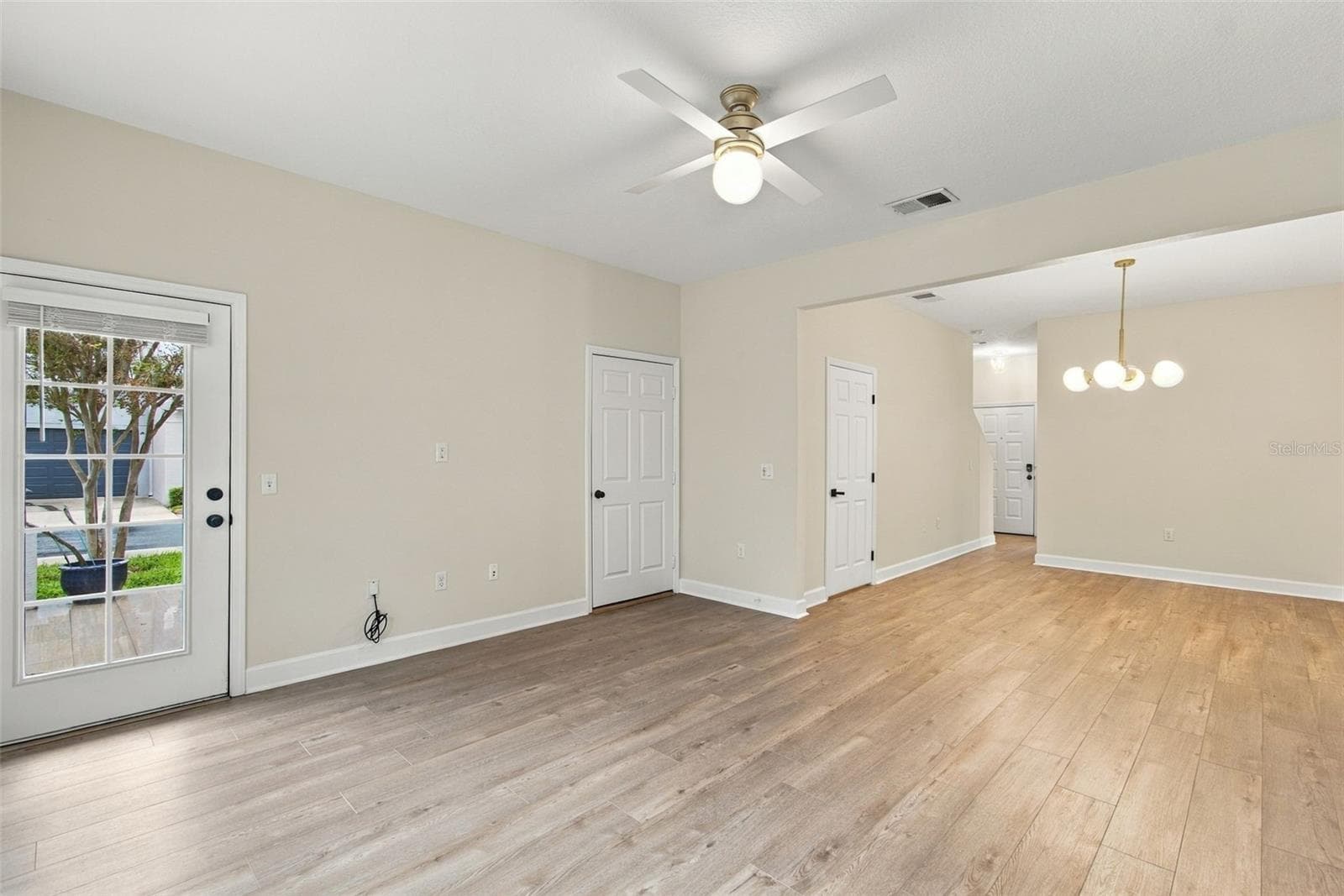Living Room/Dining Room Combo, with access to Garage & Back Patio - 5303 POINT PLEASANT LN, TAMPA