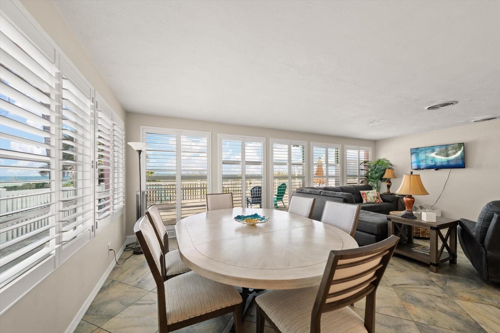 Main home-Living room area with dining - 1512 GULF BLVD, INDIAN ROCKS BEACH