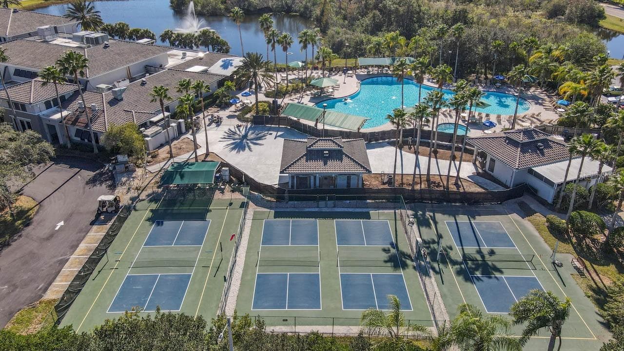 Pickleball courts and pool - 2617 NEWCOMB CT, SUN CITY CENTER