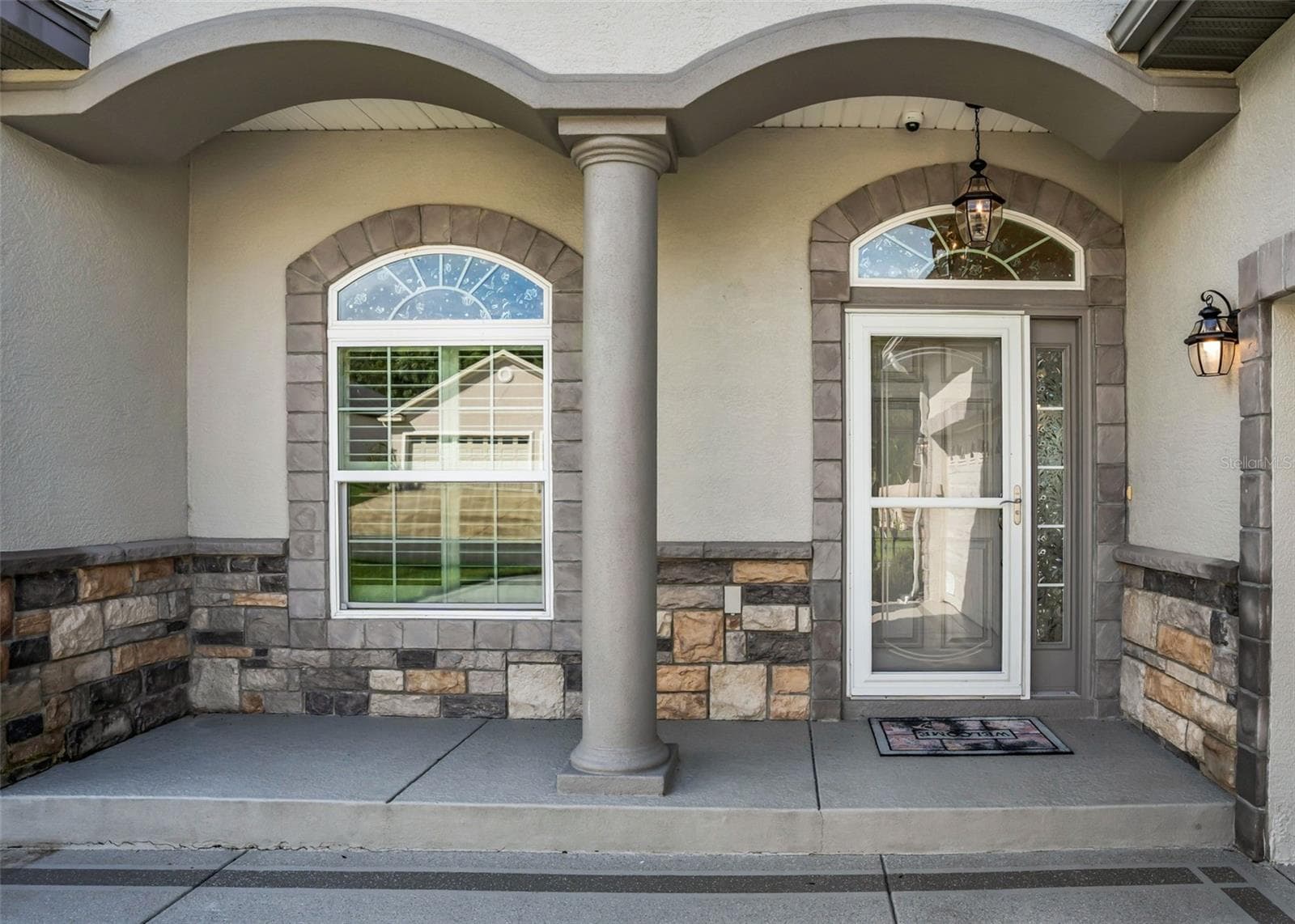 Covered Front Entry w/Storm door & Sidelight accent - 11252 SE 170TH PL, SUMMERFIELD