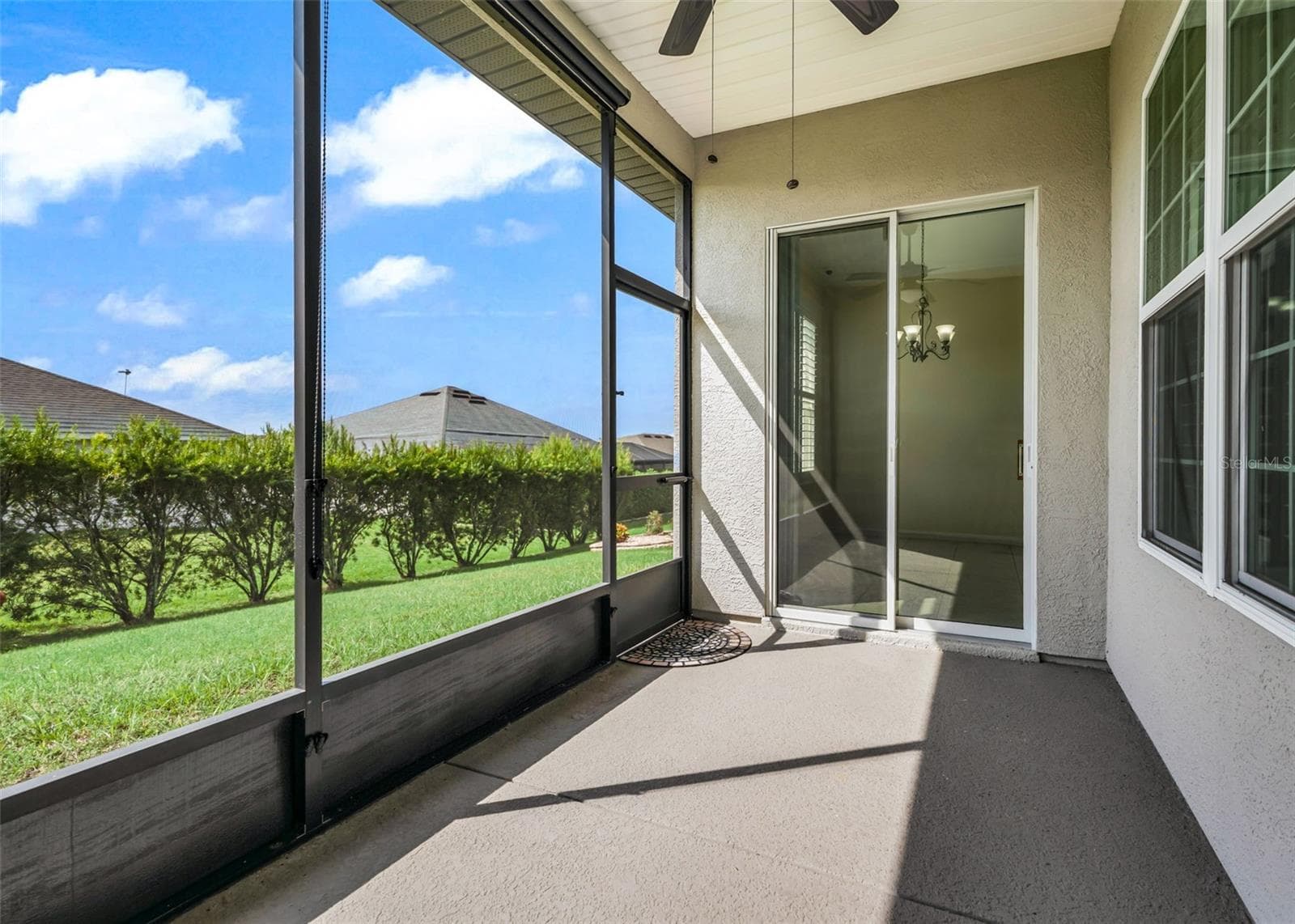 Screened lanai w/access to kitchen - 11252 SE 170TH PL, SUMMERFIELD