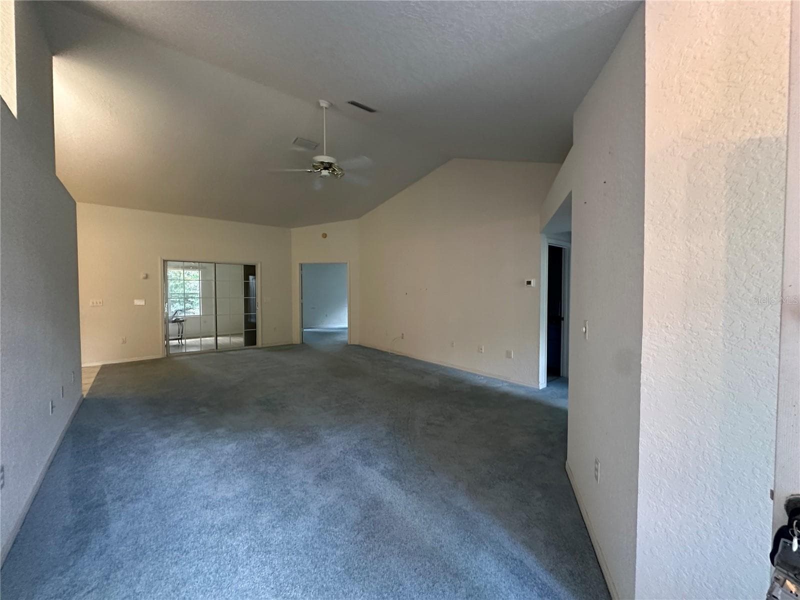 Living Room with vaulted ceiling - 10816 SW 83RD AVE, OCALA
