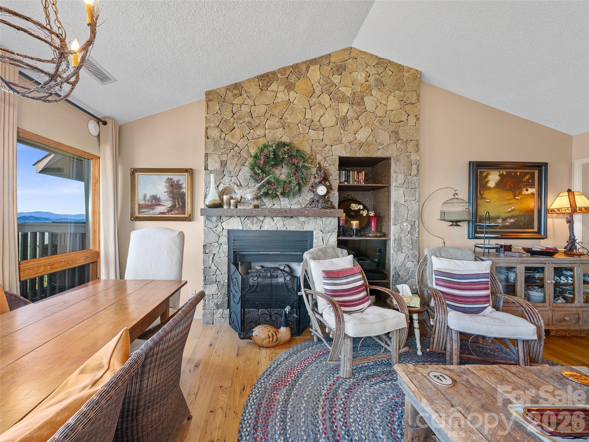 Floor to ceiling stone fireplace with gas-logs - 80 Slickrock Road, Burnsville