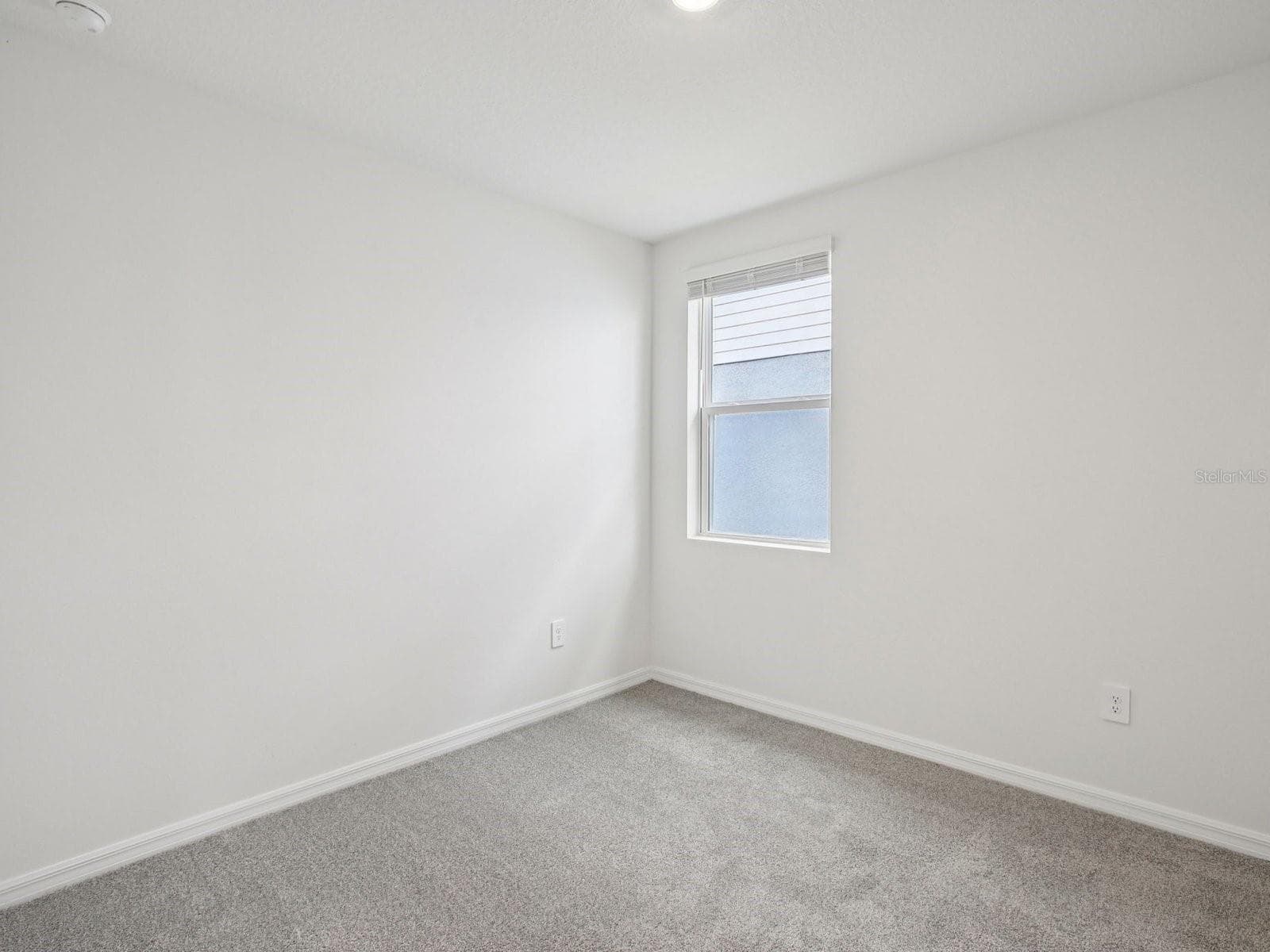 Photo is not of the actual home, but is an inspirational photo of builder’s model home and may depict options, furnishings, and/or decorator features that are not included. - 1532 BREKEY WAY, ZEPHYRHILLS