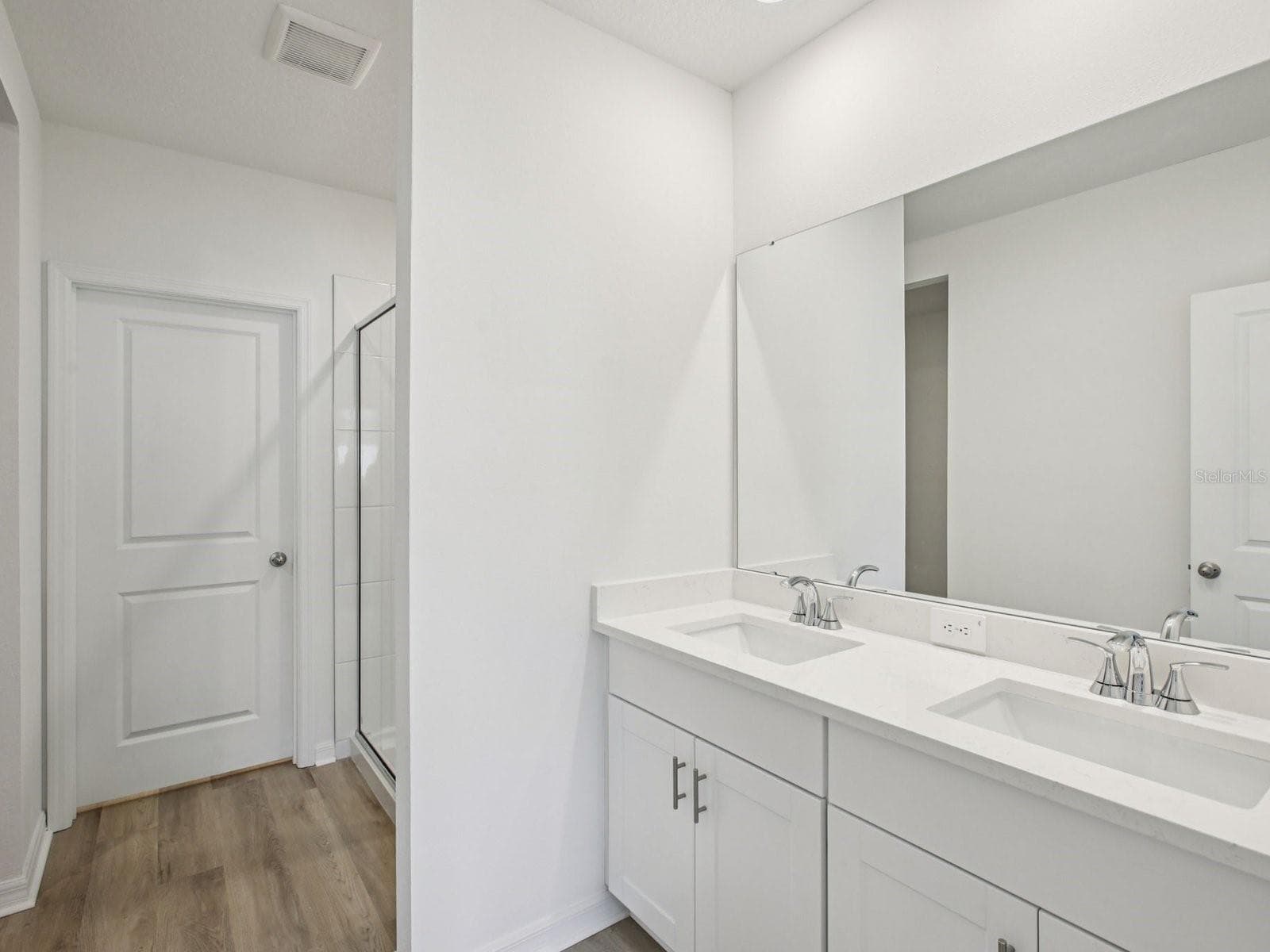 Photo is not of the actual home, but is an inspirational photo of builder’s model home and may depict options, furnishings, and/or decorator features that are not included. - 1532 BREKEY WAY, ZEPHYRHILLS