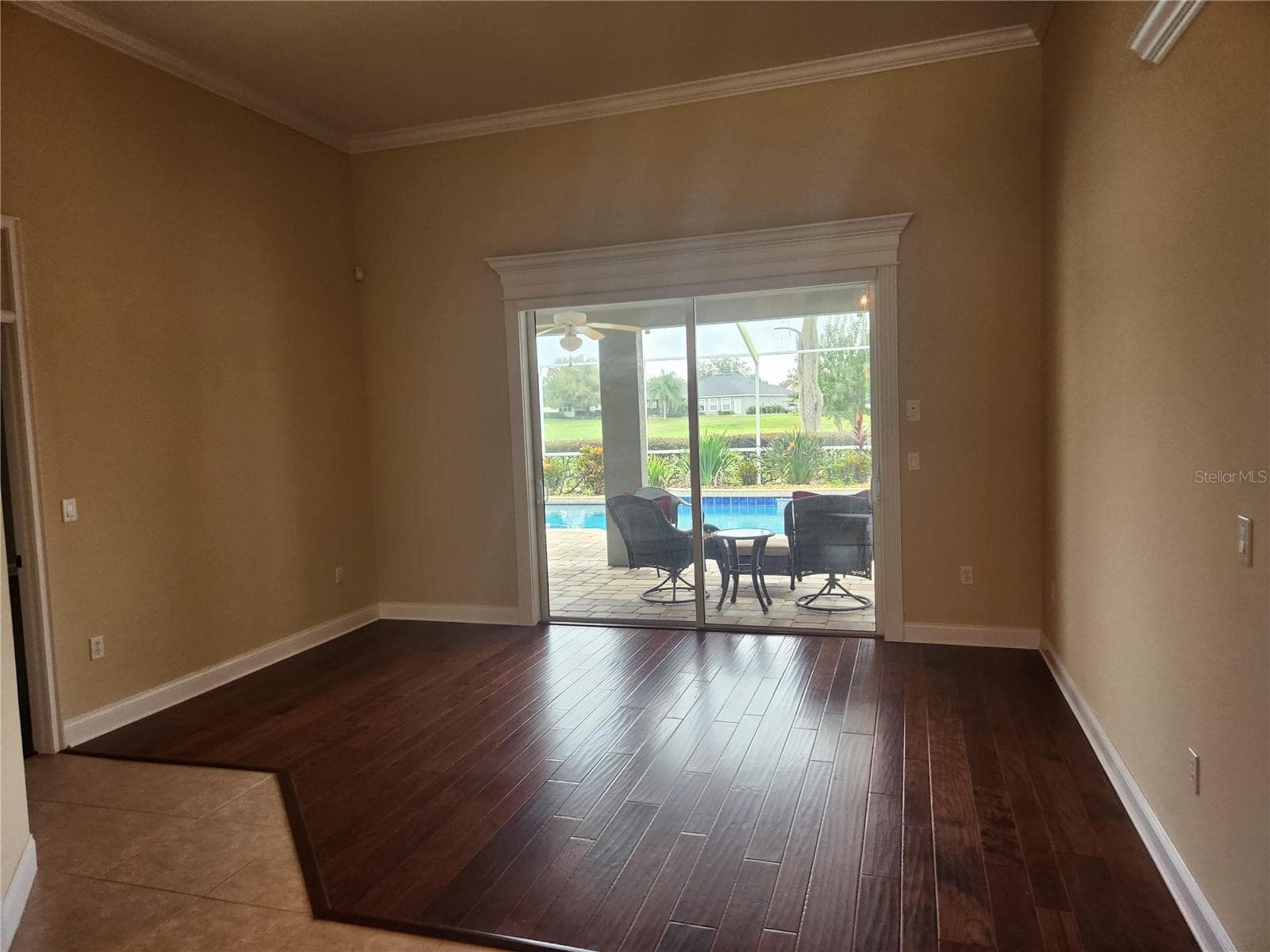 Living room without furniture..Beautiful engineered hardwood flooring - 455 OSPREY LANDING WAY, LAKELAND