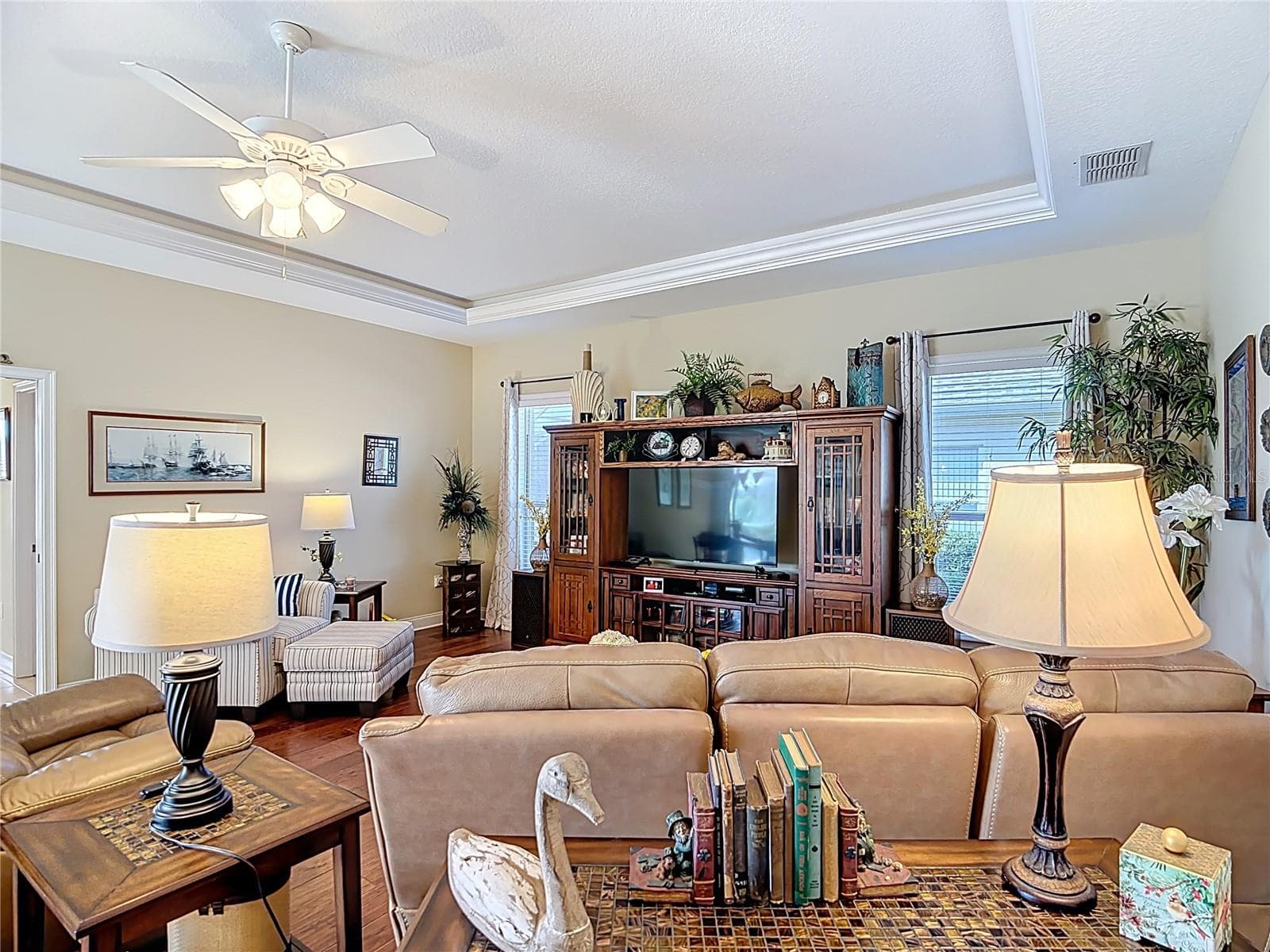 Tray ceiling compliments family room - 455 OSPREY LANDING WAY, LAKELAND