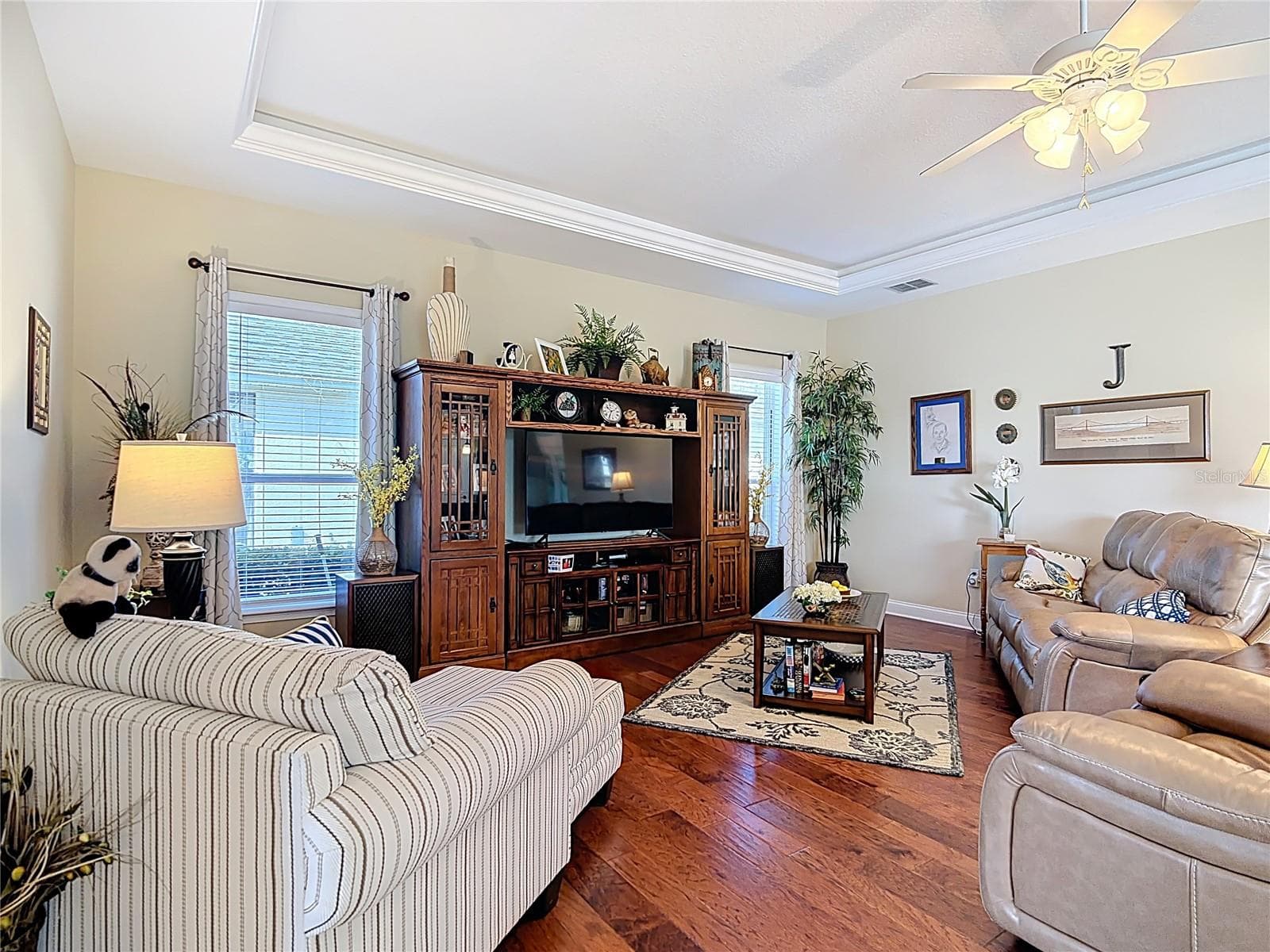 Family Room engineered hardwood flooring - 455 OSPREY LANDING WAY, LAKELAND