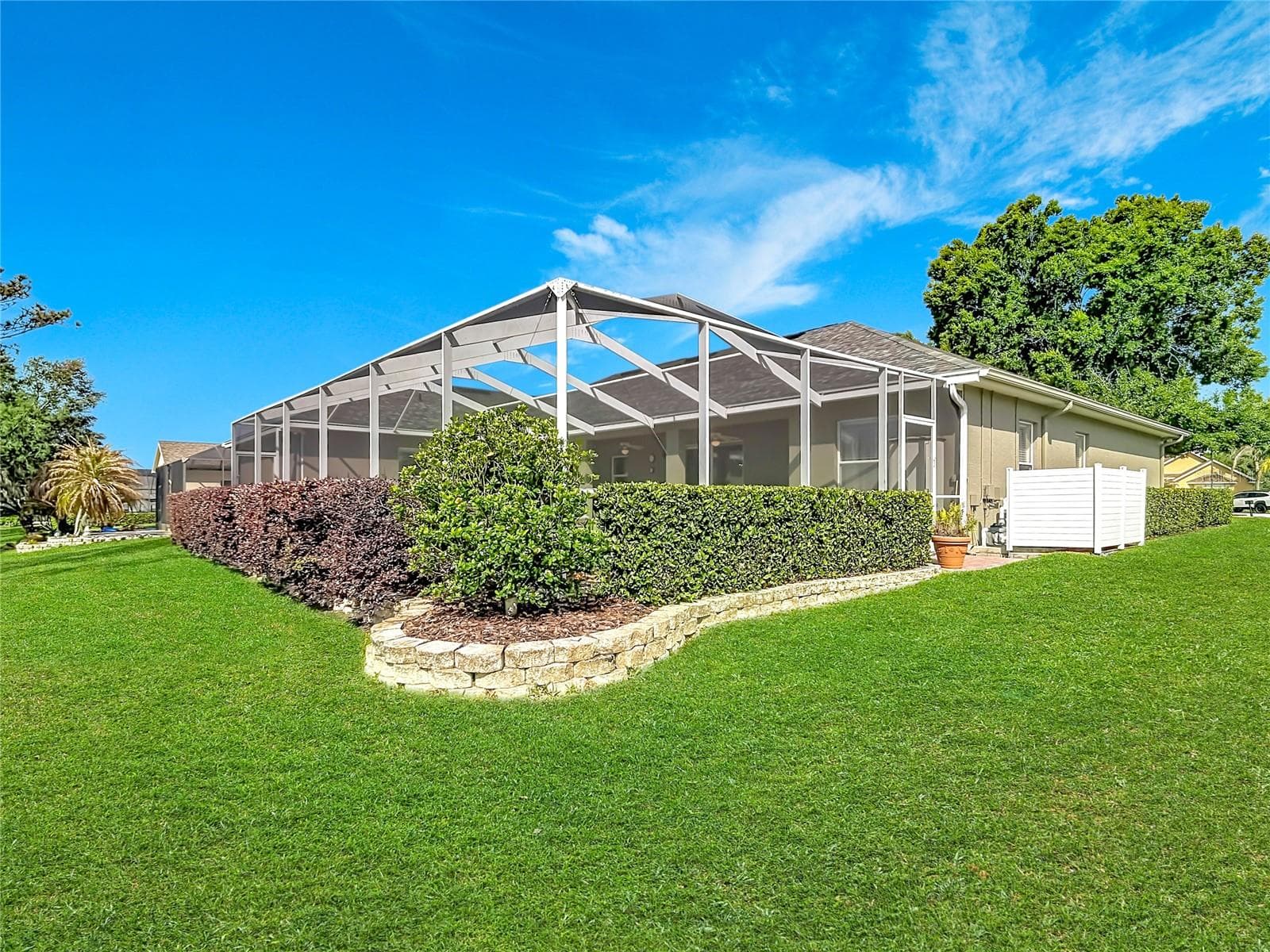 Rear view of Pool cage - 455 OSPREY LANDING WAY, LAKELAND