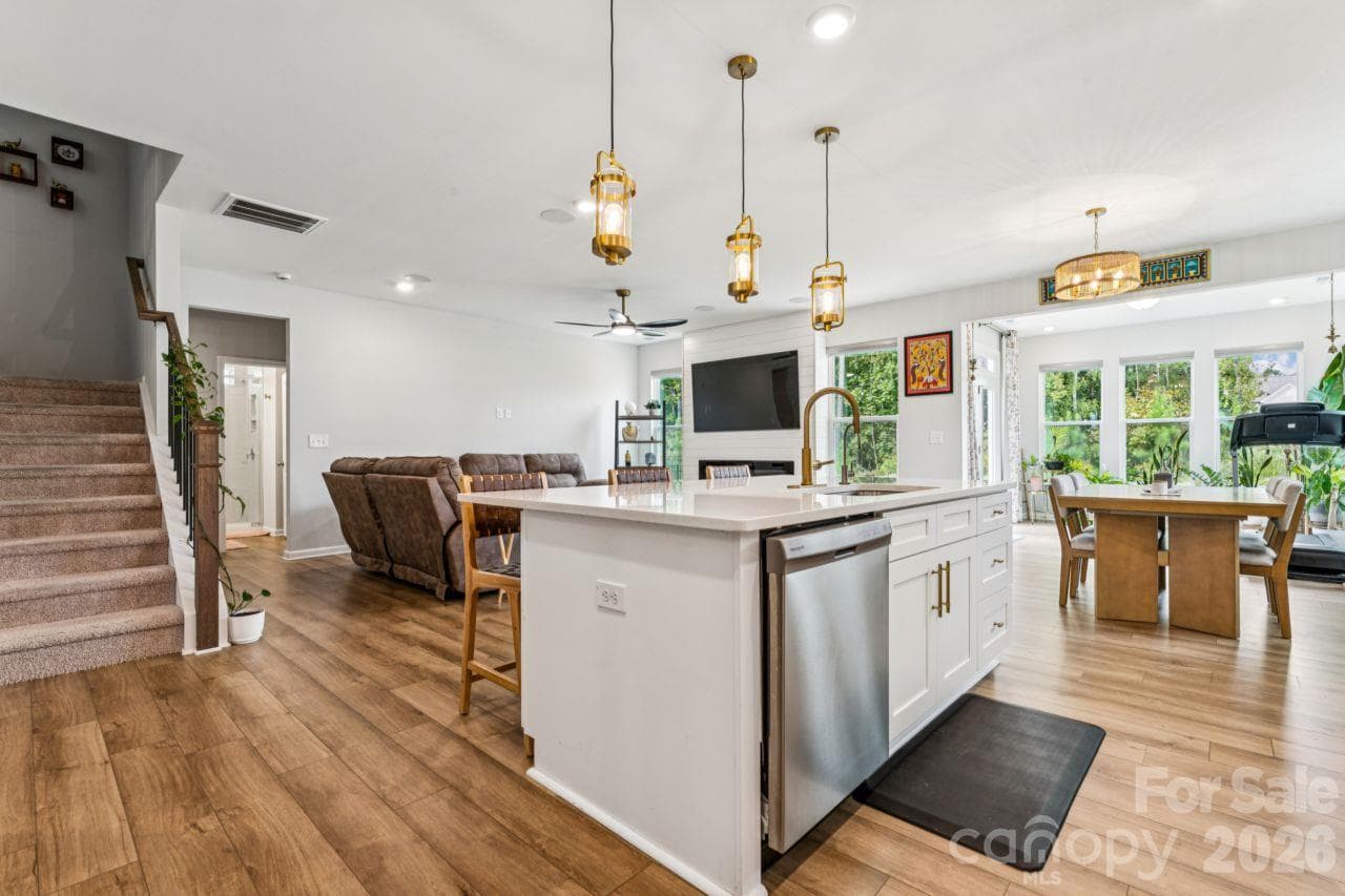 Kitchen and living room into breakfast nook - 8704 Frank Grier Road, Charlotte