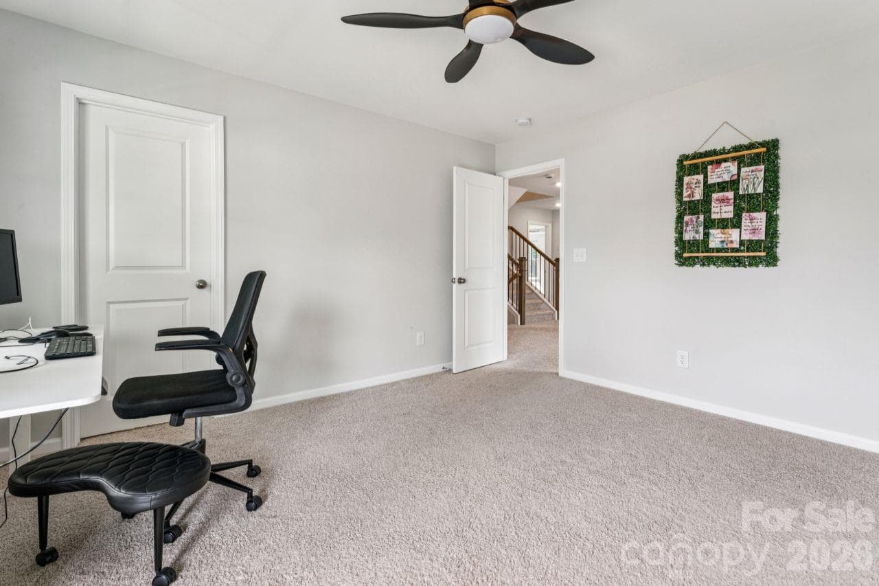 Bedroom 4 with private balcony - 8704 Frank Grier Road, Charlotte