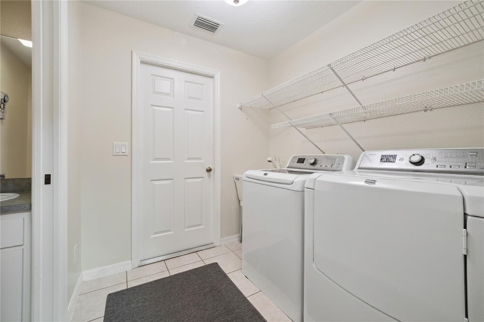 Virtually Staged/Decluttered Laundry Room - 21101 BRAVEHEART DR, LEESBURG