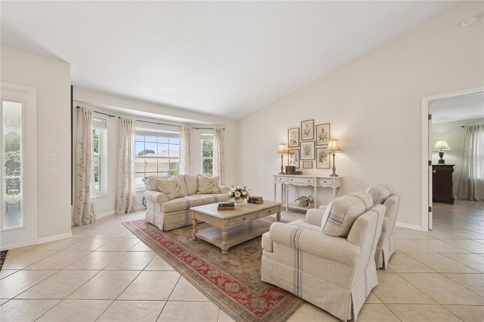 Virtually Staged Formal Living Room - 21101 BRAVEHEART DR, LEESBURG