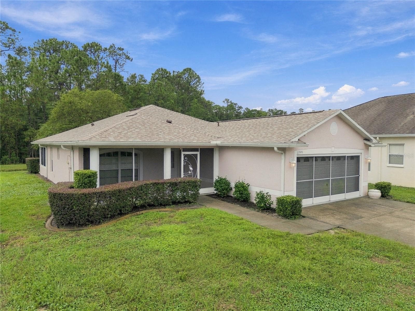 Single Family Residence at 11508 BLOOMINGTON CT, NEW PORT RICHEY, photo 3 of 90
