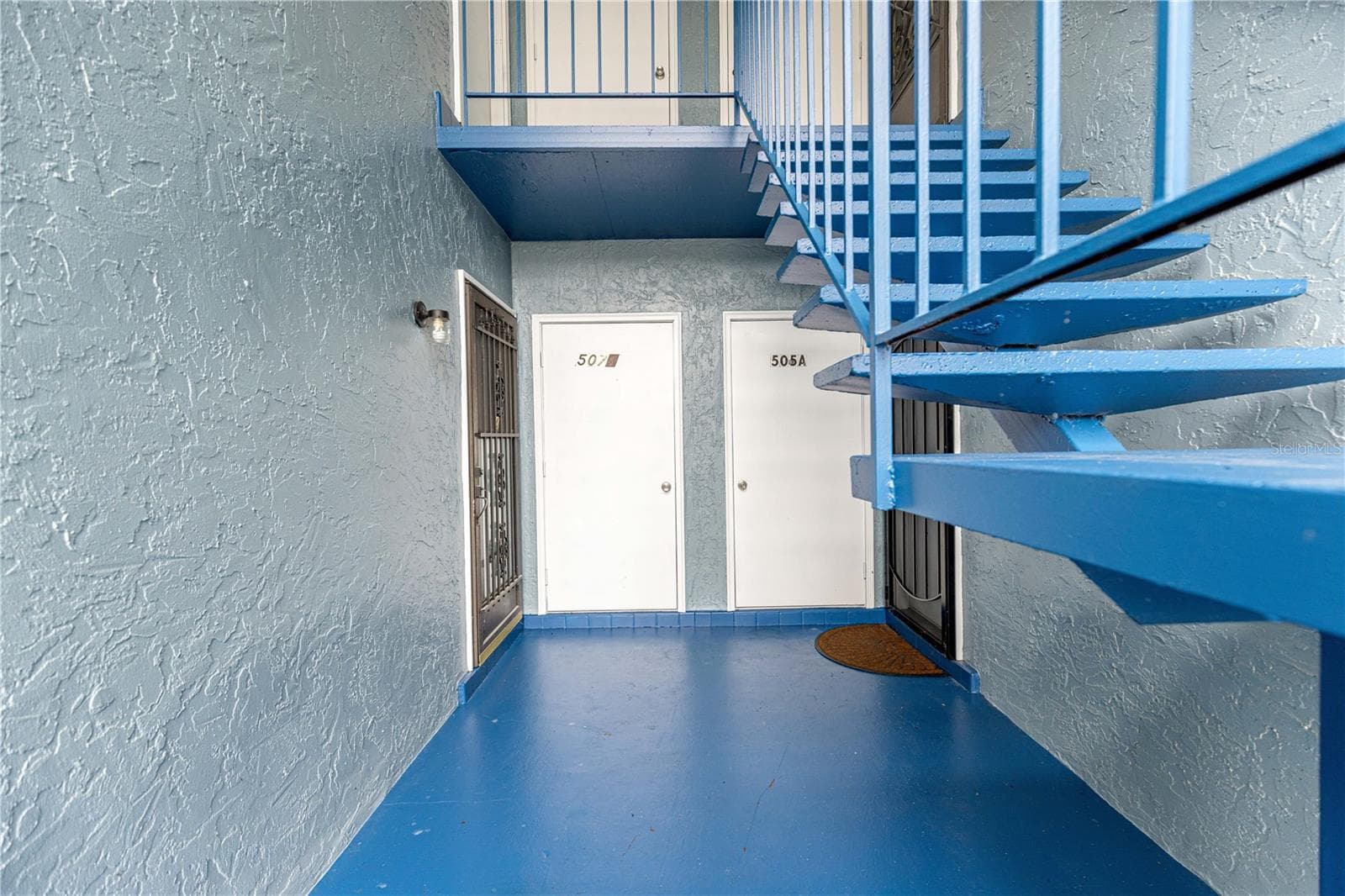 walkway to entrance - 507 FAIRWAYS LN #A, OCALA