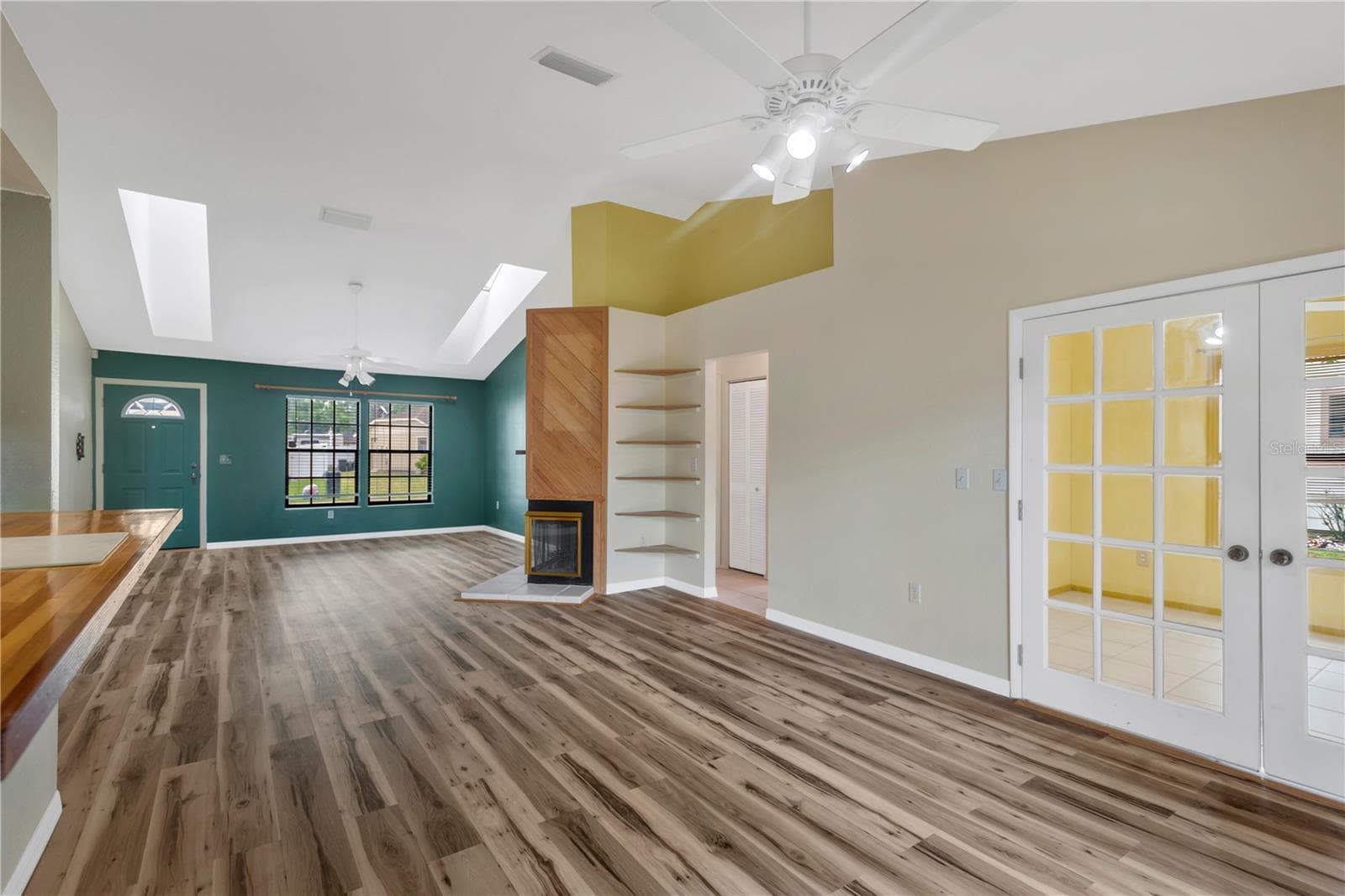 Living Room, Dining Room and French Doors leading into Office (could be used as a 3rd Bedroom when company comes) - 5546 34TH CT E, BRADENTON