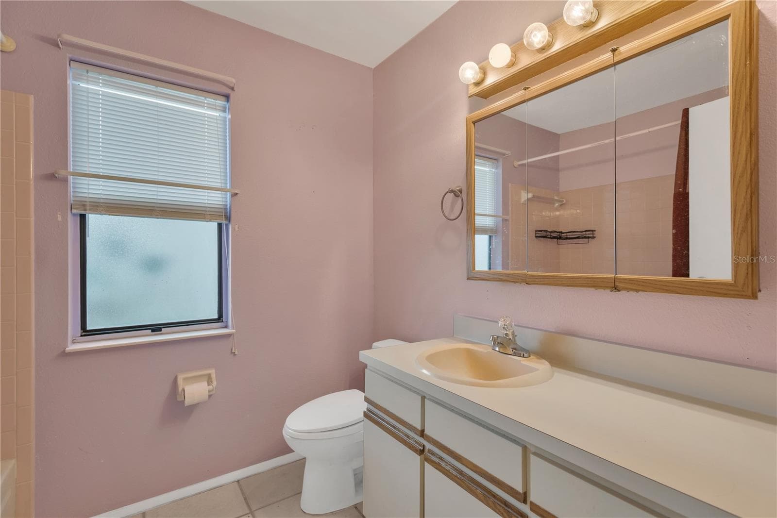 Guest Bath features a tub/shower. - 5546 34TH CT E, BRADENTON