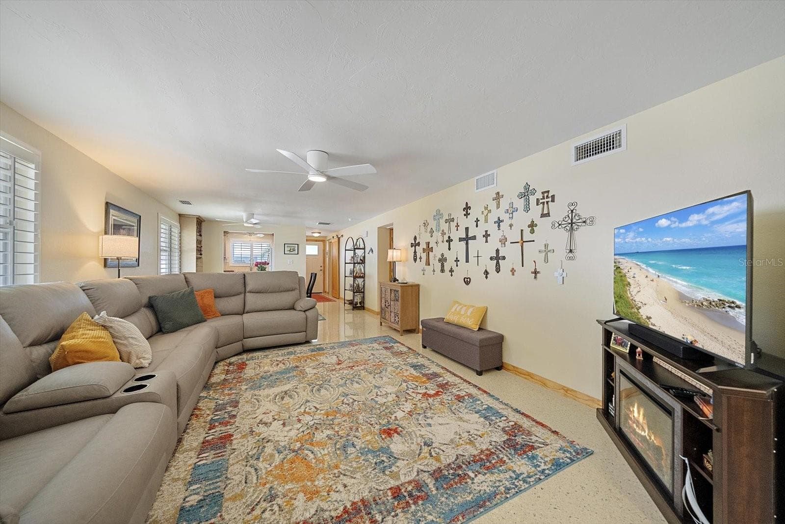 Living room with sectional seating and TV - 738 SPANISH DR S #98, LONGBOAT KEY