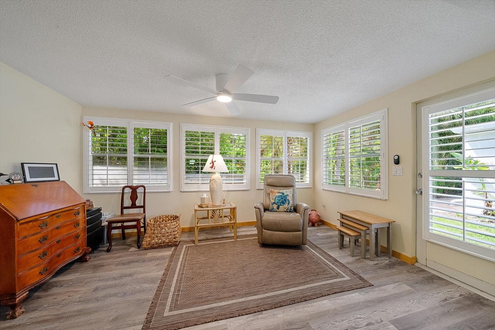 Florida room / sitting area with wicker furniture - 738 SPANISH DR S #98, LONGBOAT KEY