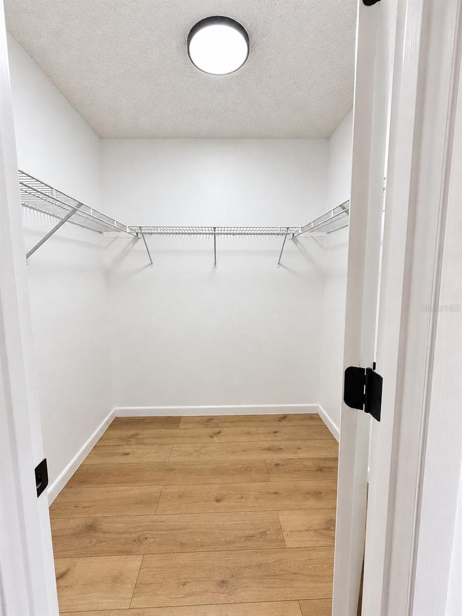 master closet - 86 LAKE DAISY BLVD, WINTER HAVEN