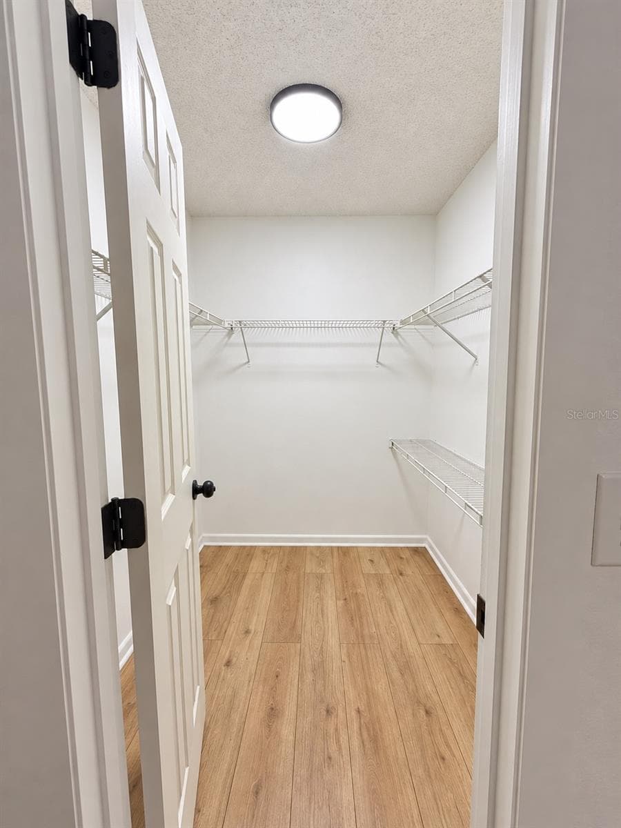 guest closet - 86 LAKE DAISY BLVD, WINTER HAVEN