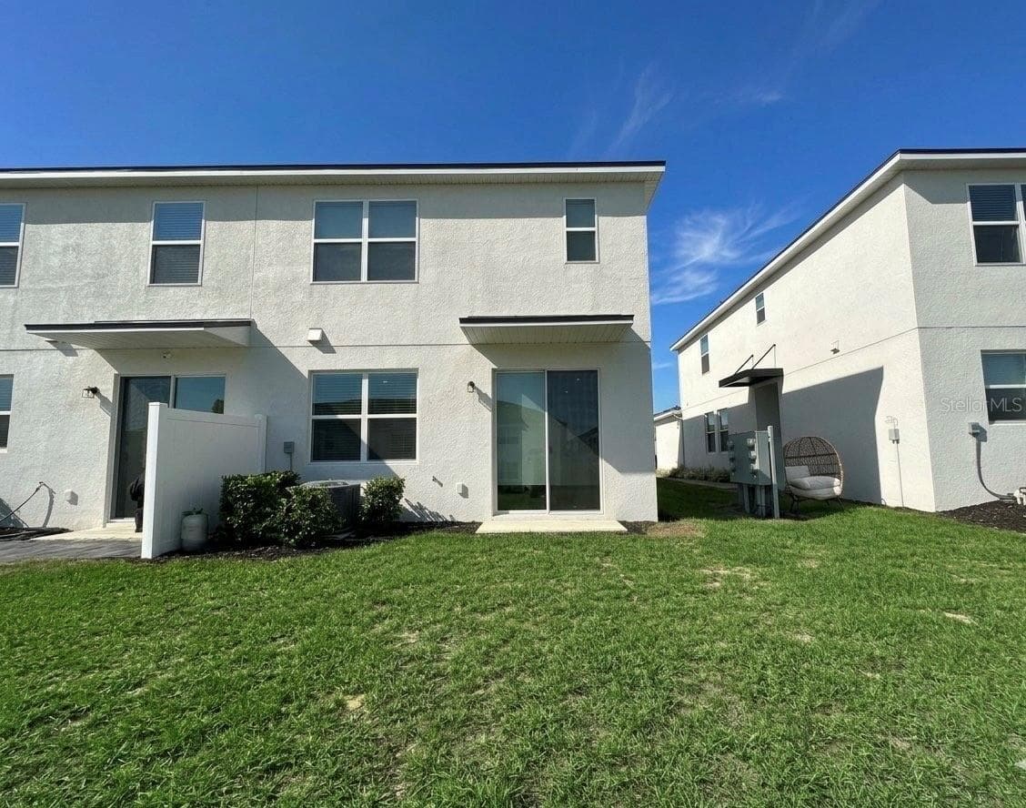 Back exterior end unit - 1123 BOARDWALK PL, KISSIMMEE